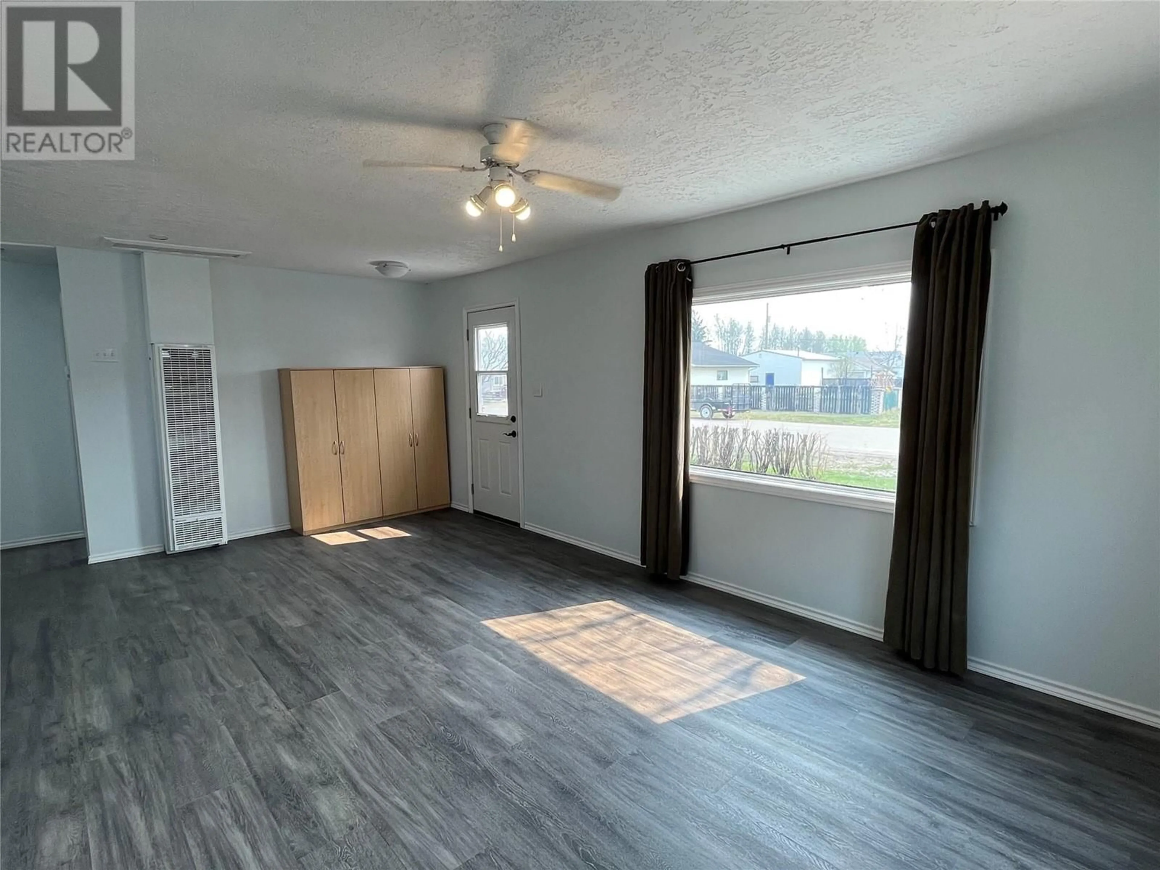 A pic of a room, wood floors for 5002 48 Avenue, Pouce Coupe British Columbia V0C2C0