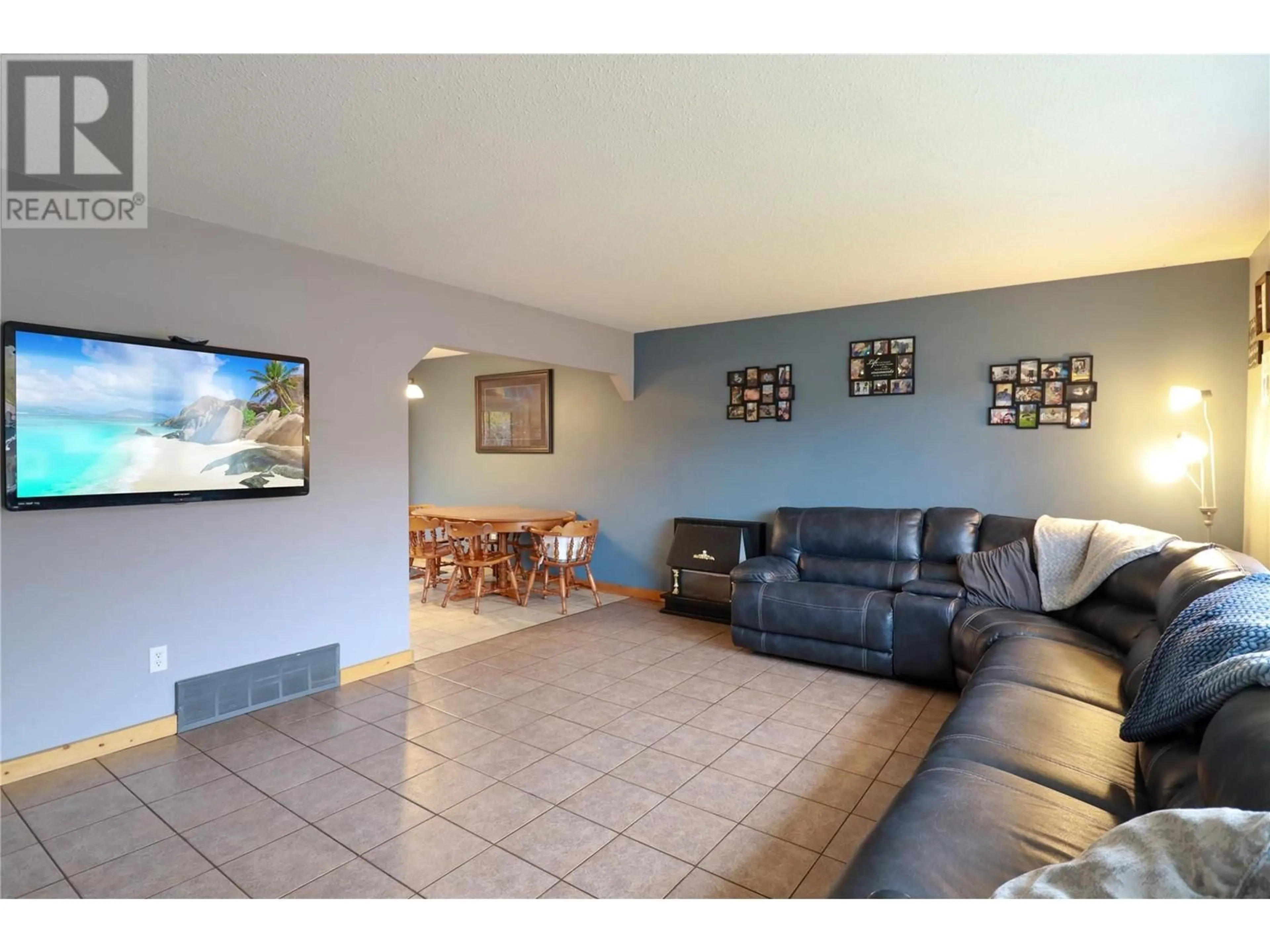 Living room, cement floor for 817 Birch Street, Okanagan Falls British Columbia V0H1R0