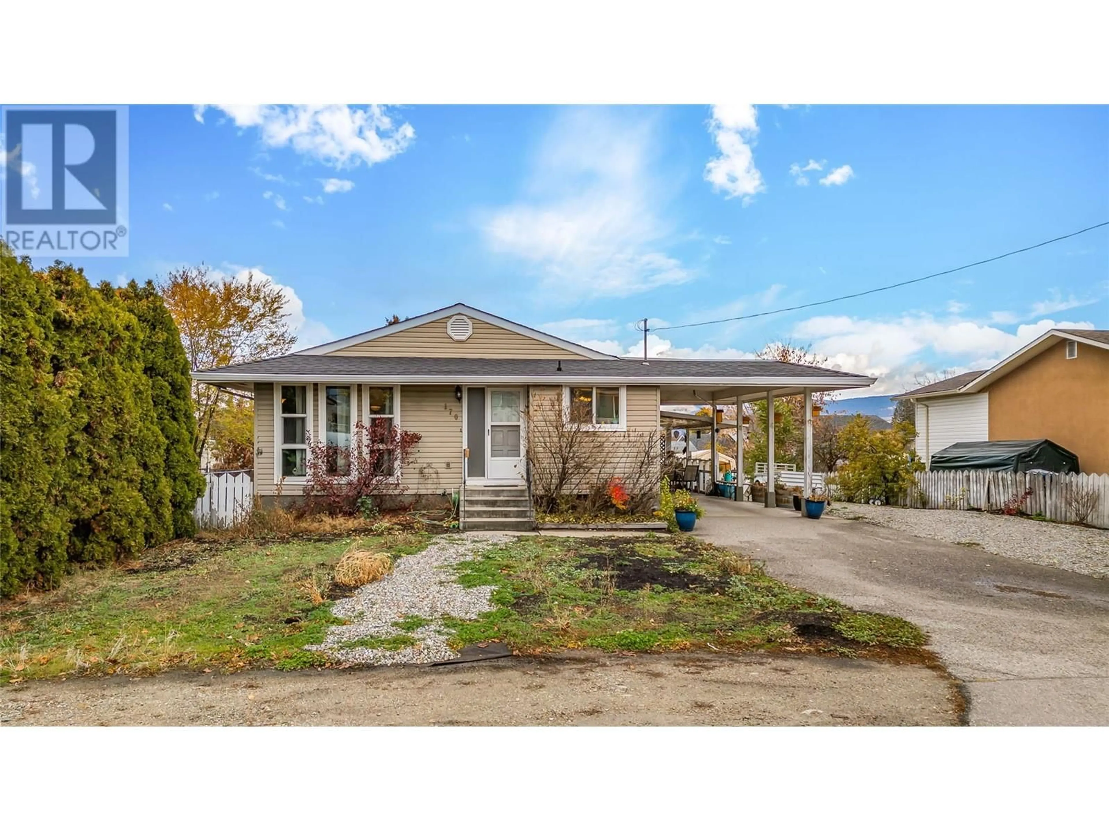 Frontside or backside of a home, the street view for 170 Mars Road, Kelowna British Columbia V1Y8E7