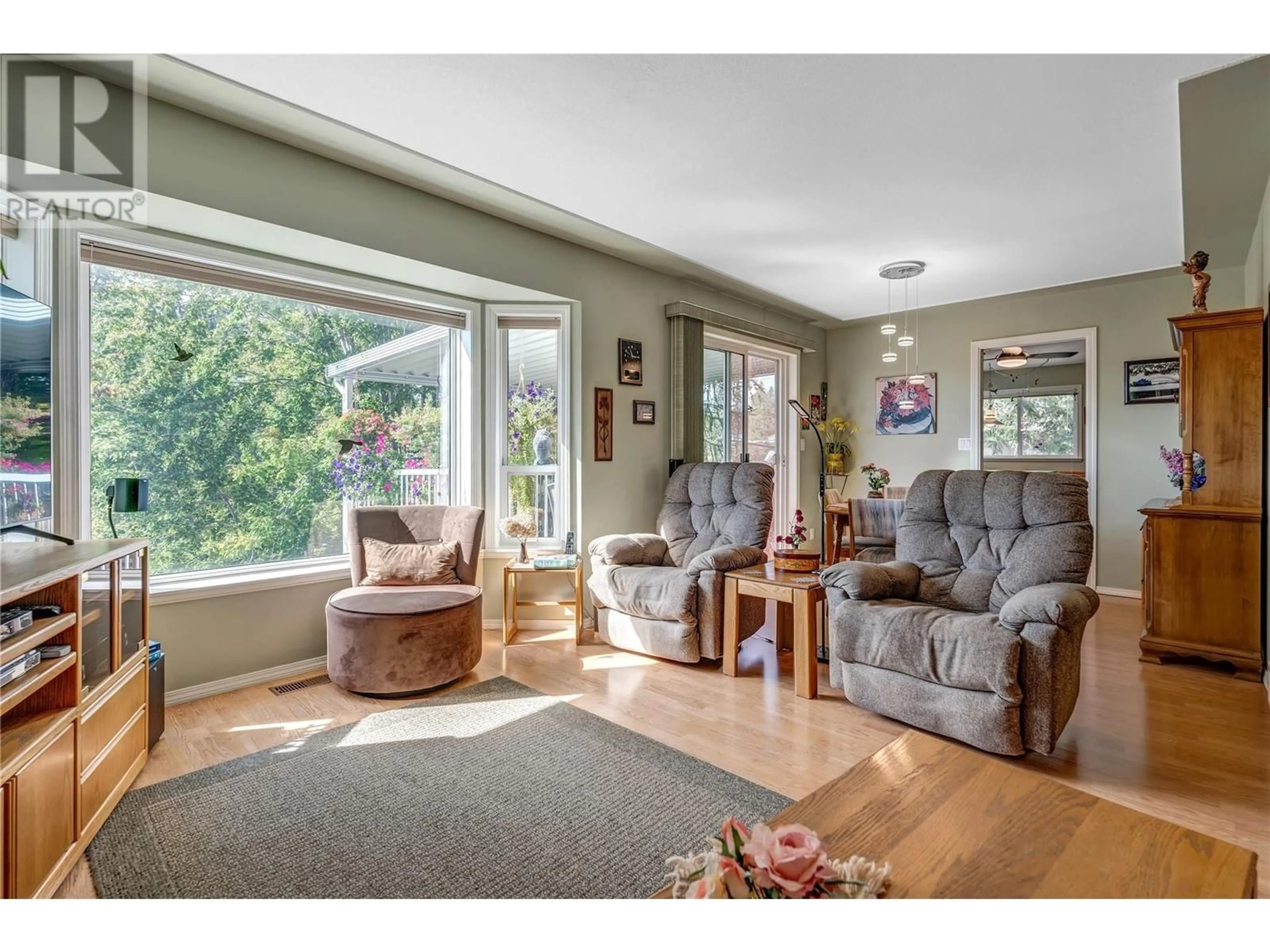 Living room, wood floors for 14483 Sutherland Place, Summerland British Columbia V0H1Z8