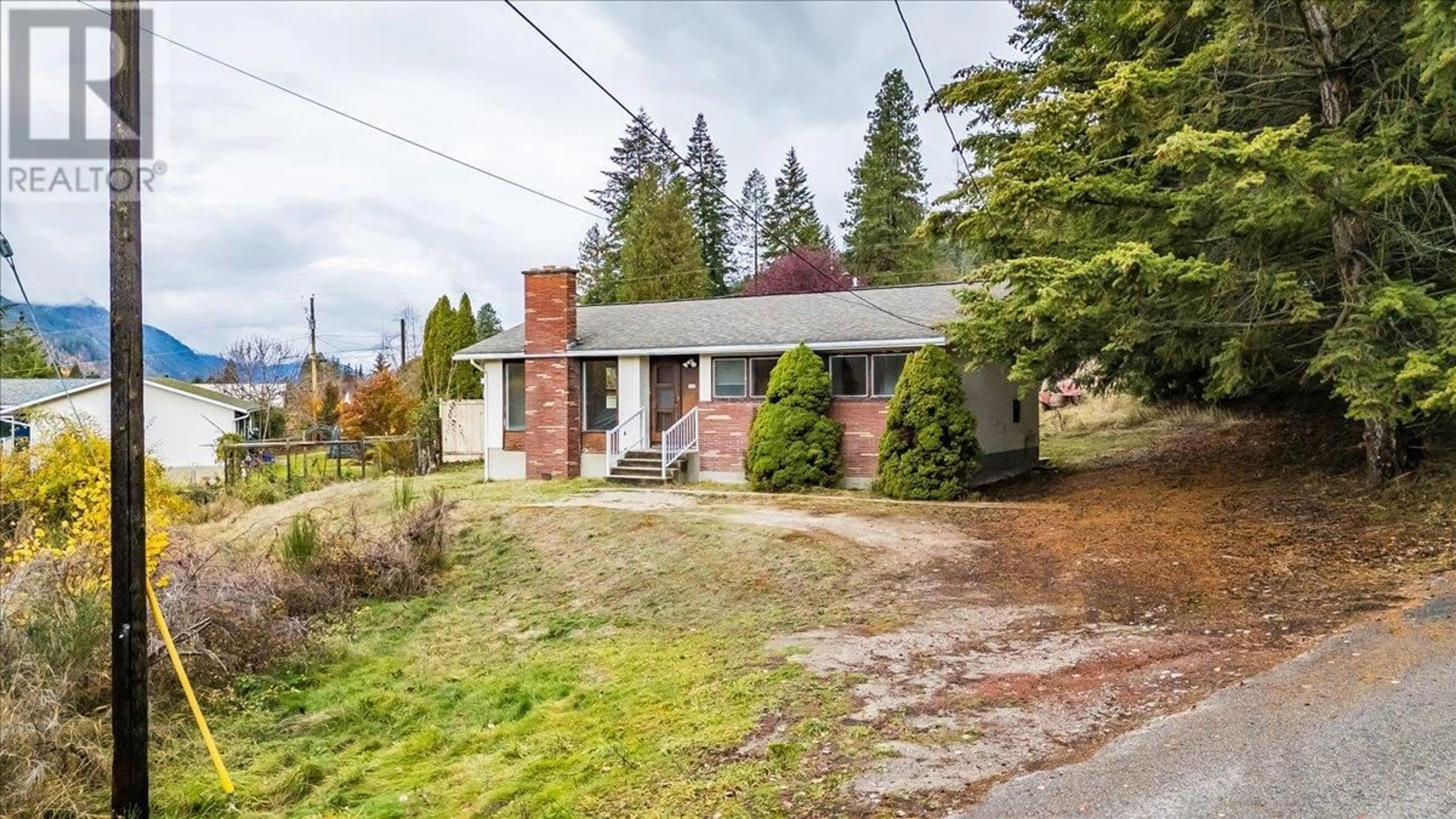 Frontside or backside of a home, cottage for 1110 McDiarmid Road, Castlegar British Columbia V1N4V8