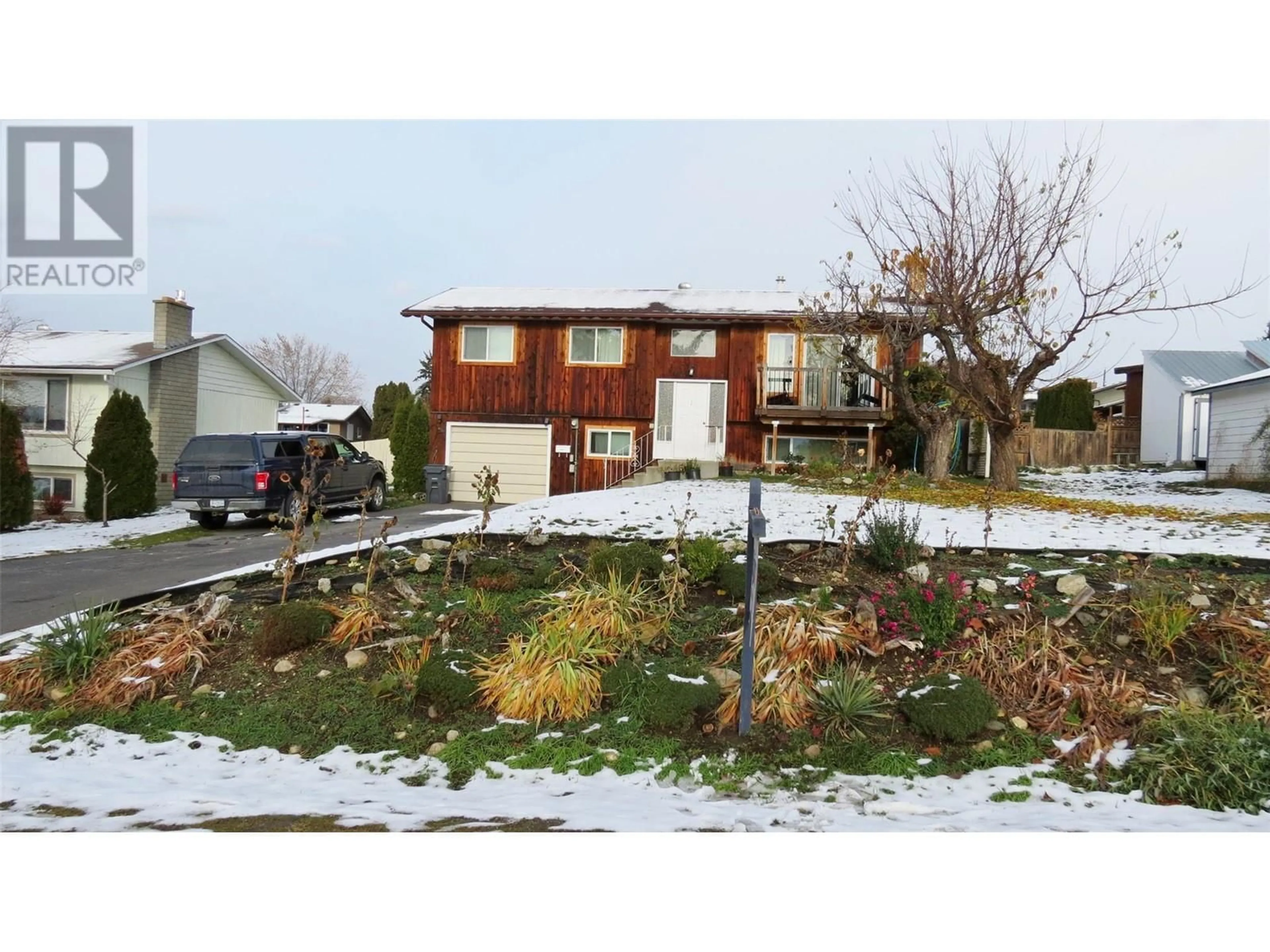 Frontside or backside of a home, the street view for 5615 McClure Road, Vernon British Columbia V1B3P8