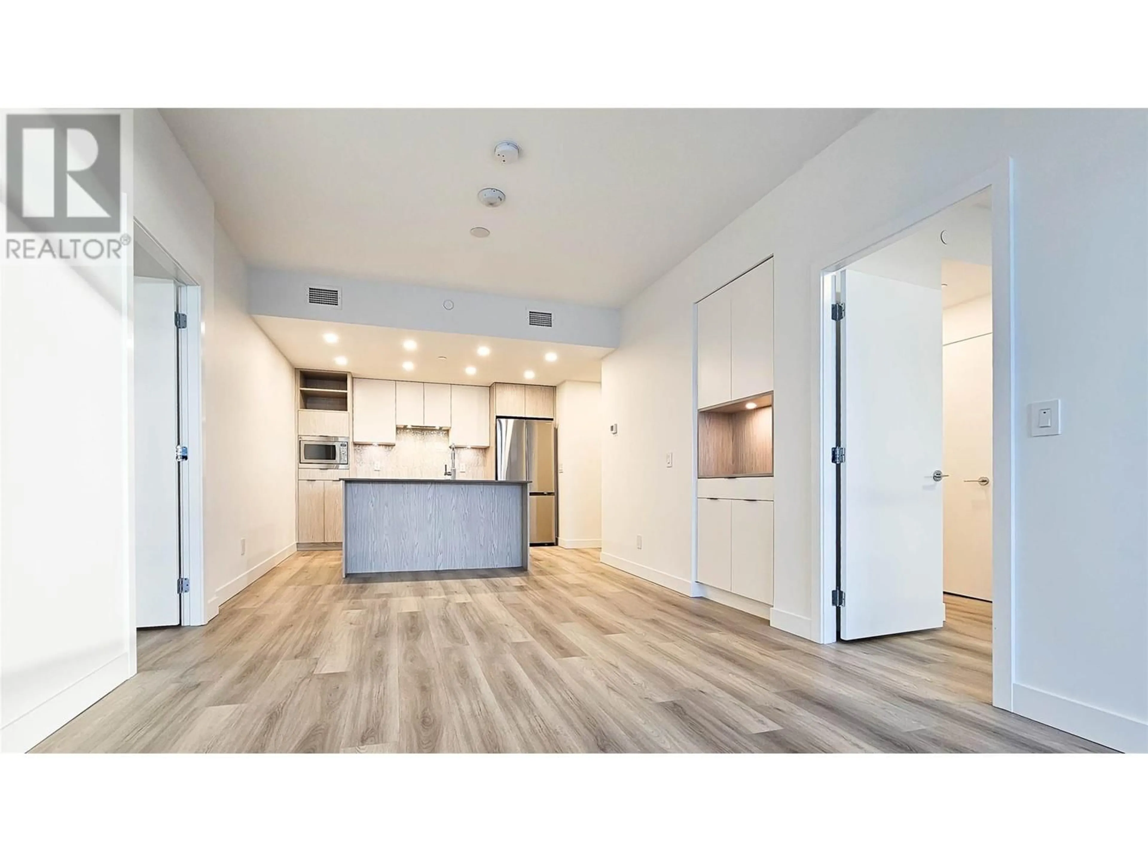 Open concept kitchen for 1488 Bertram Street Unit# 3301, Kelowna British Columbia V1Y6P2