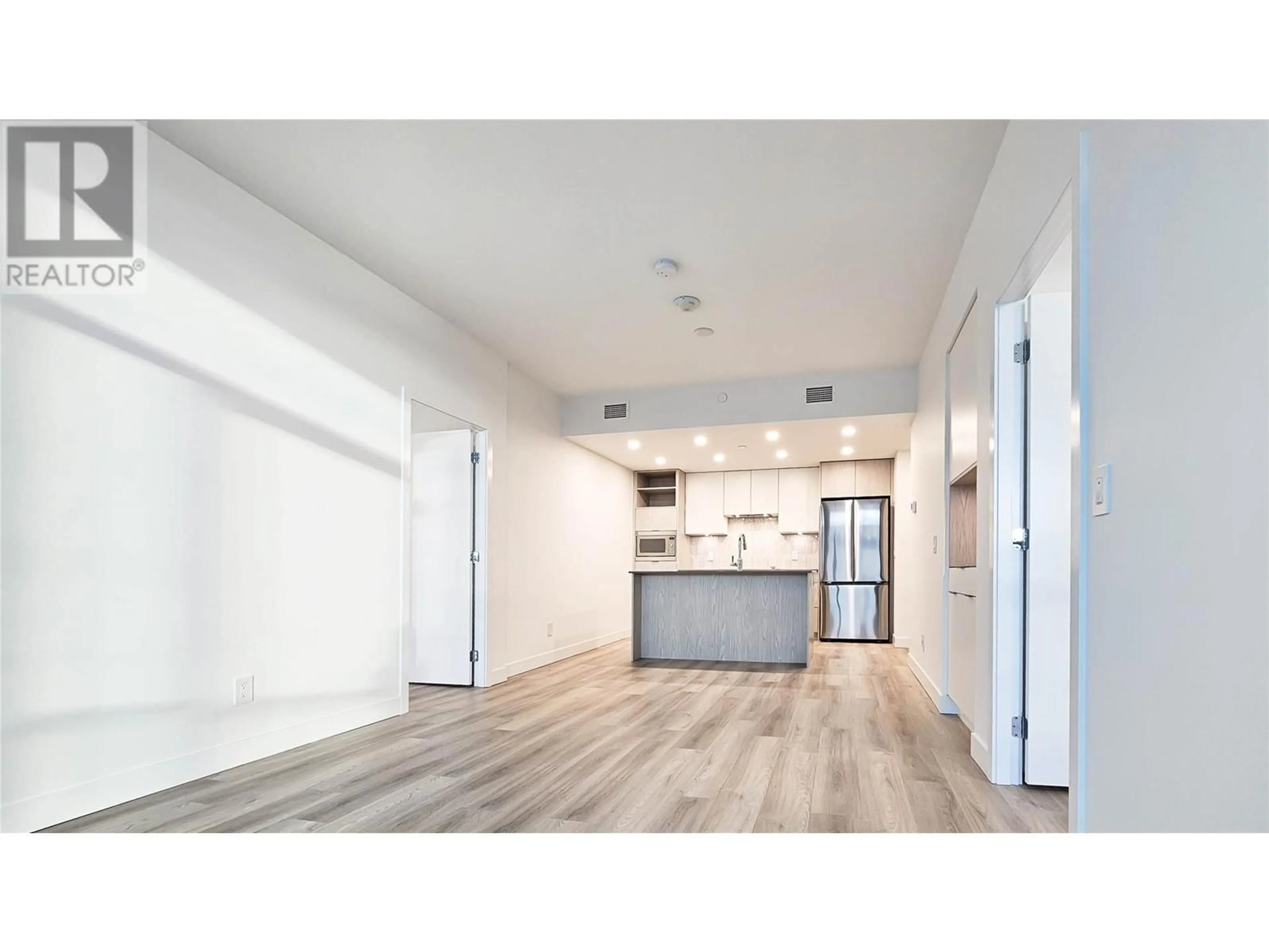 Open concept kitchen for 1488 Bertram Street Unit# 3301, Kelowna British Columbia V1Y6P2