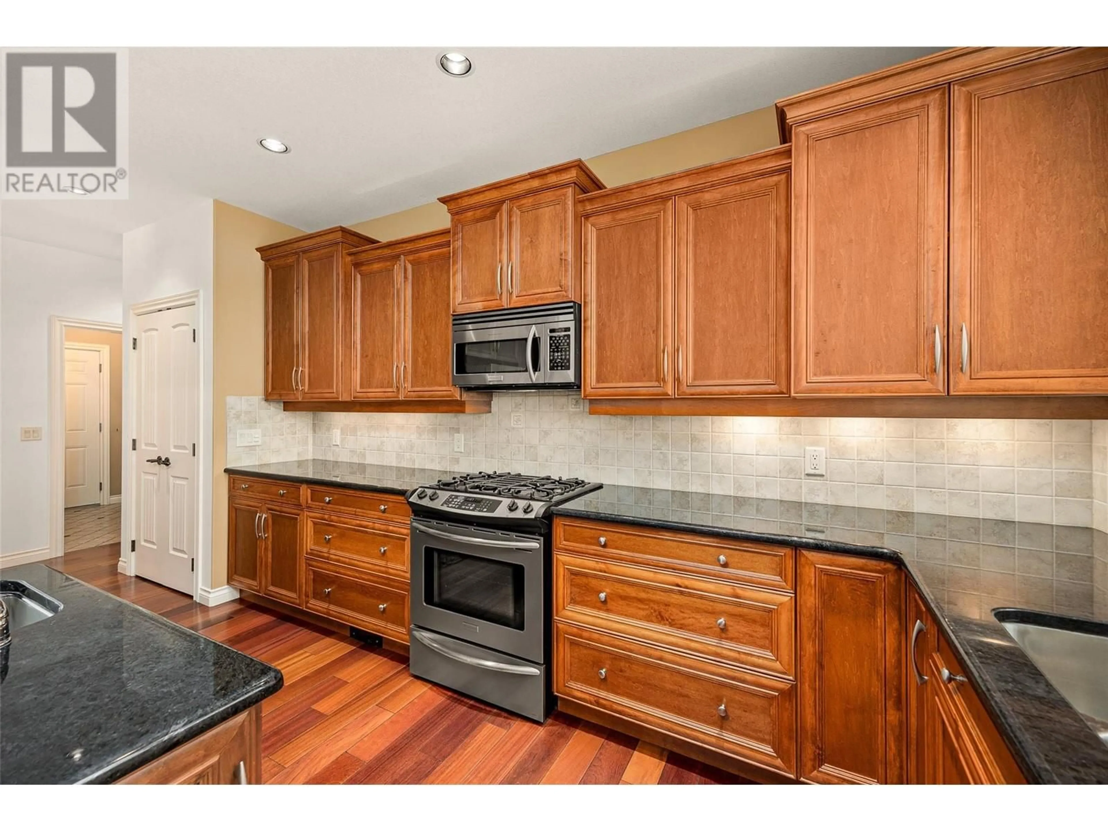 Kitchen, wood floors, cottage for 649 Devonian Avenue, Kelowna British Columbia V1W4Z8