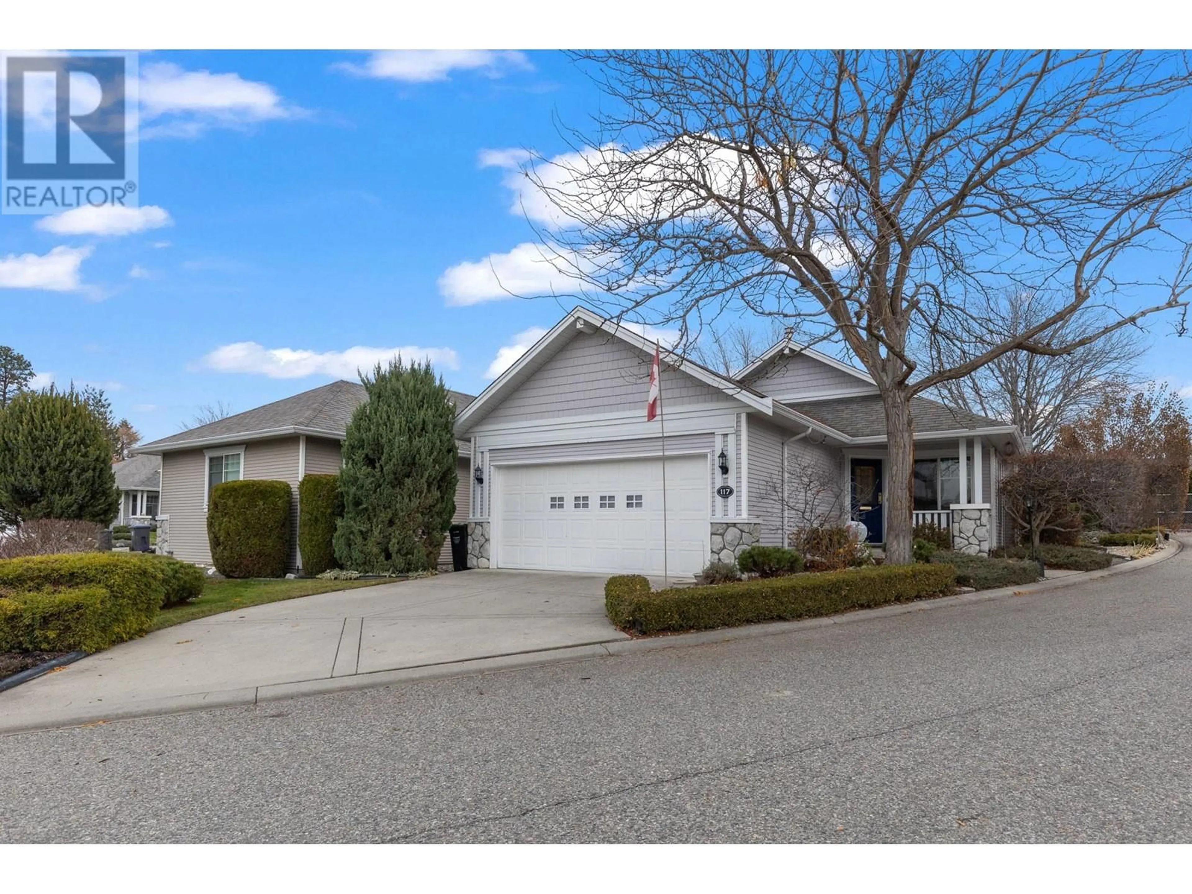 Frontside or backside of a home, the street view for 1321 Ridgeway Drive Unit# 117, Kelowna British Columbia V1Y9T6