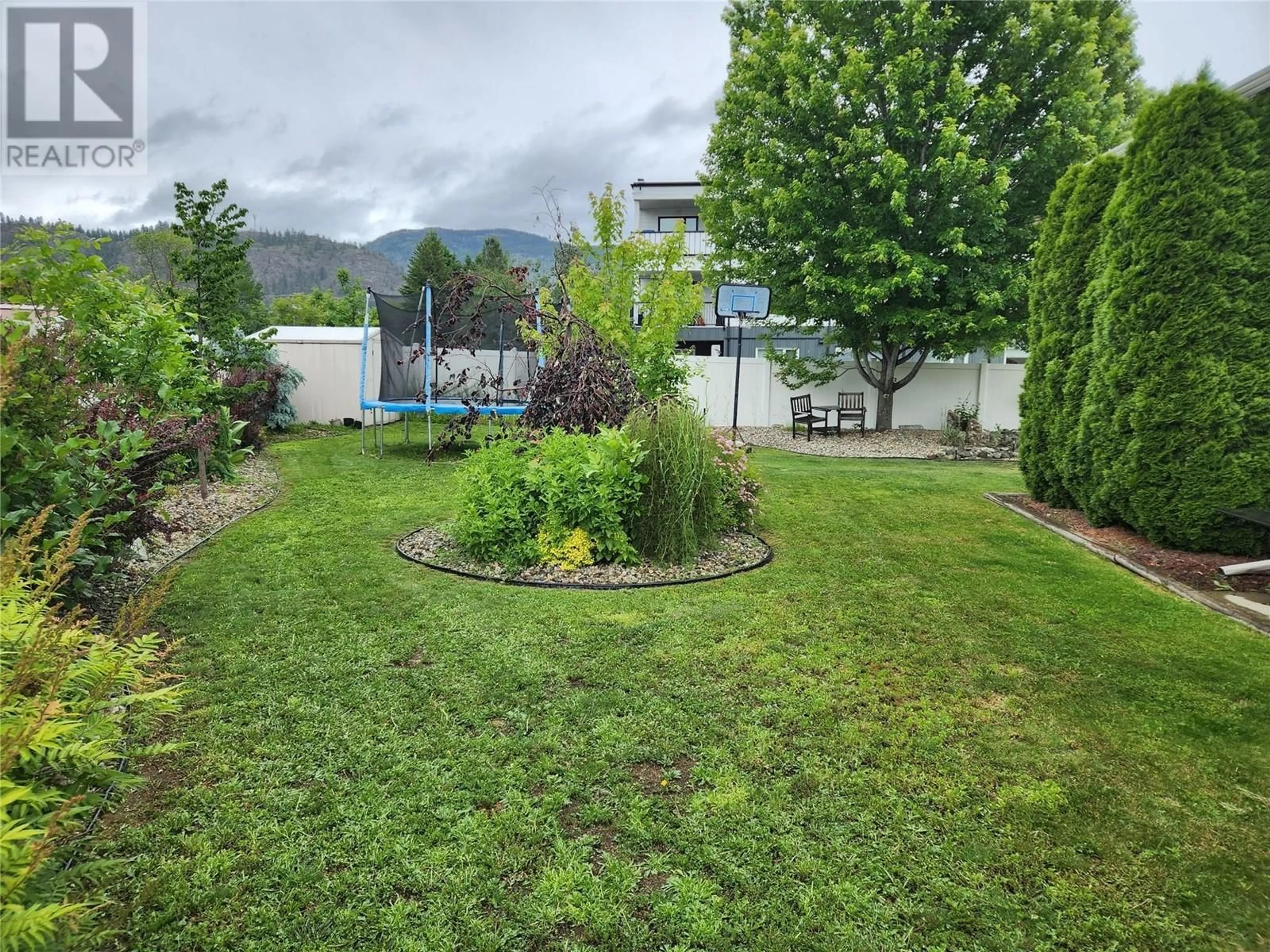 Patio, the fenced backyard for 2160 BRYCEN Place, Grand Forks British Columbia V0H1H0