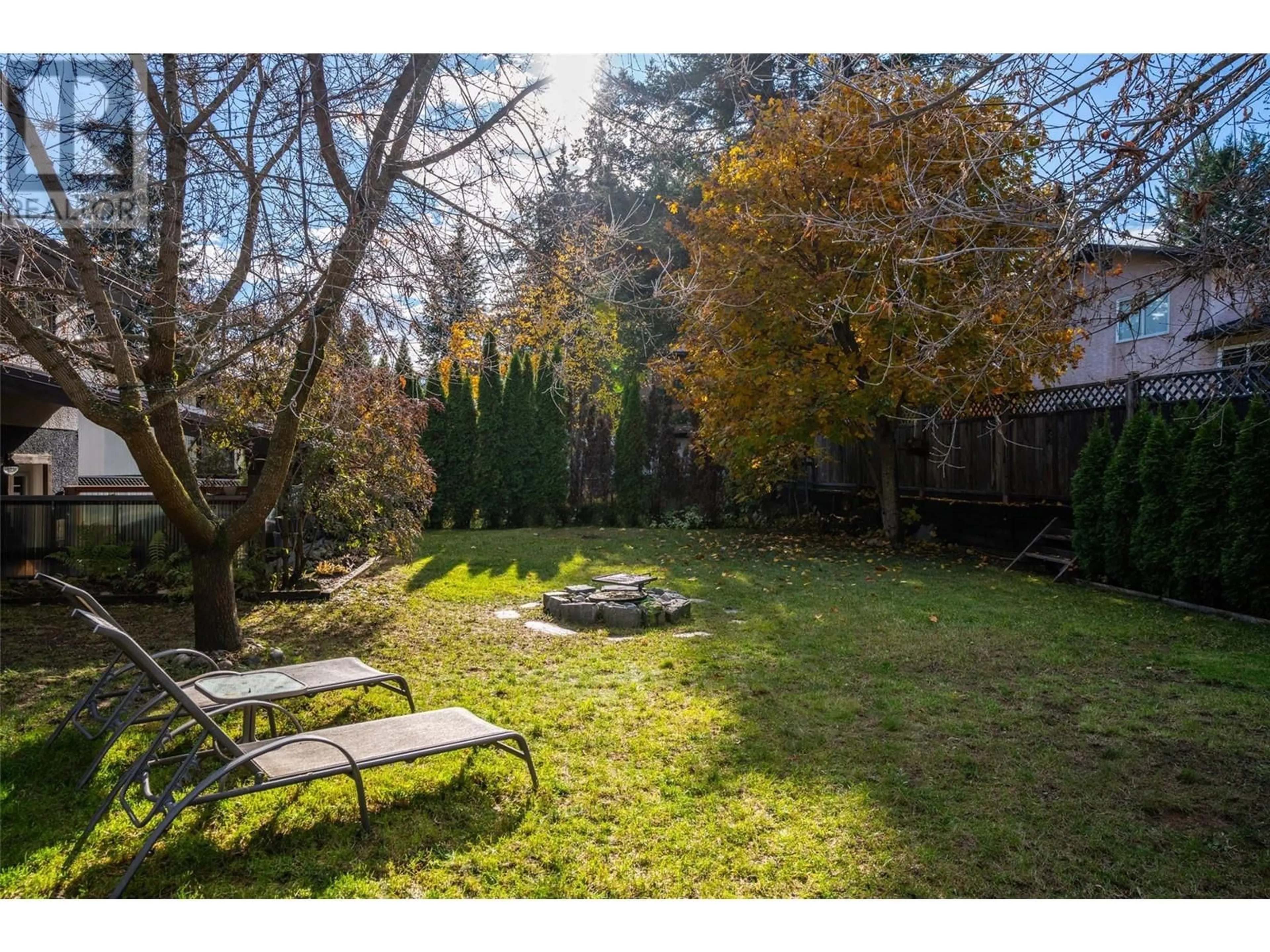 Patio, the fenced backyard for 67 Burke Drive, Revelstoke British Columbia V0E2S0