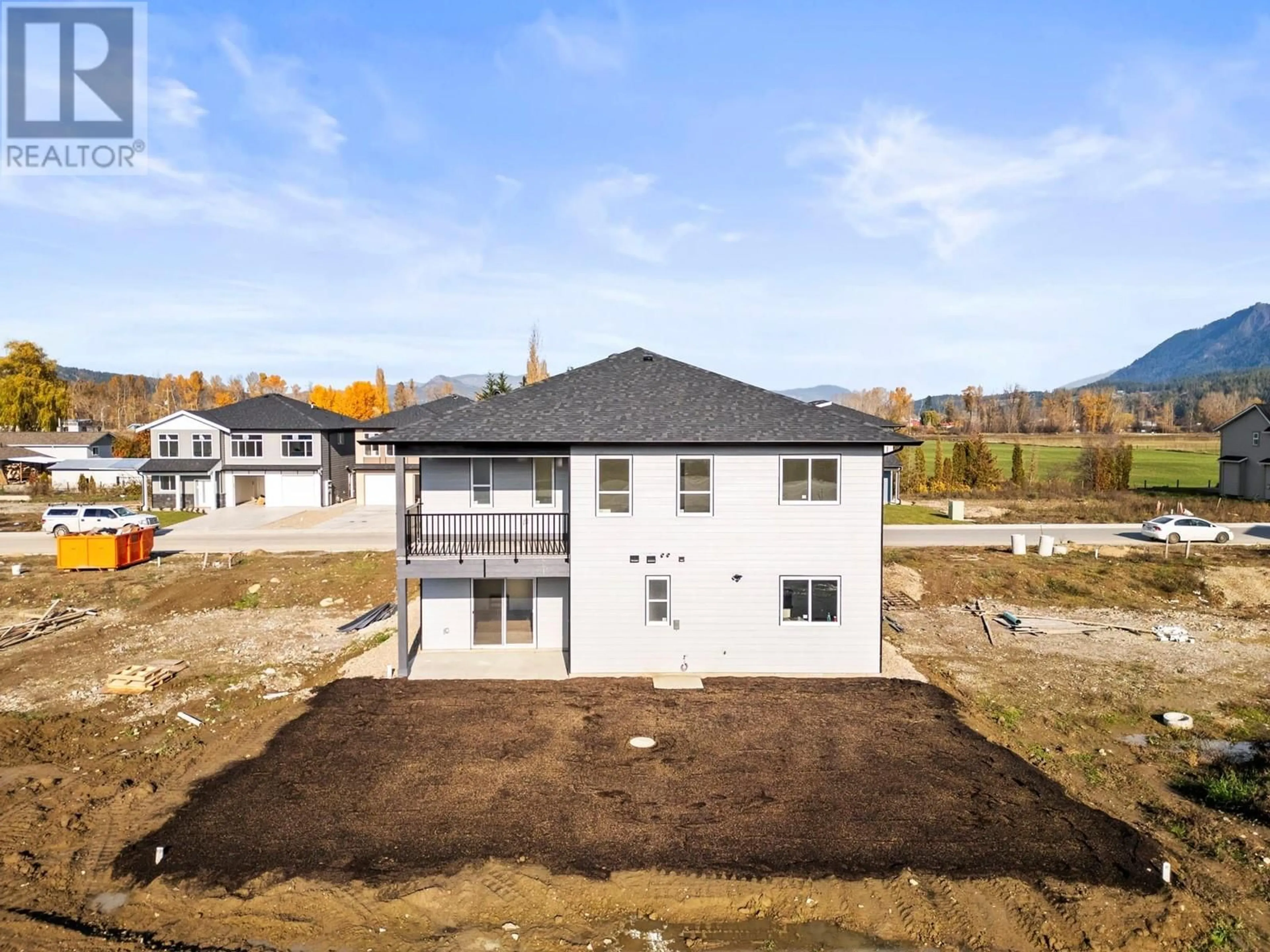 Frontside or backside of a home, the fenced backyard for 2220 Heitman Street, Enderby British Columbia V0E1V2