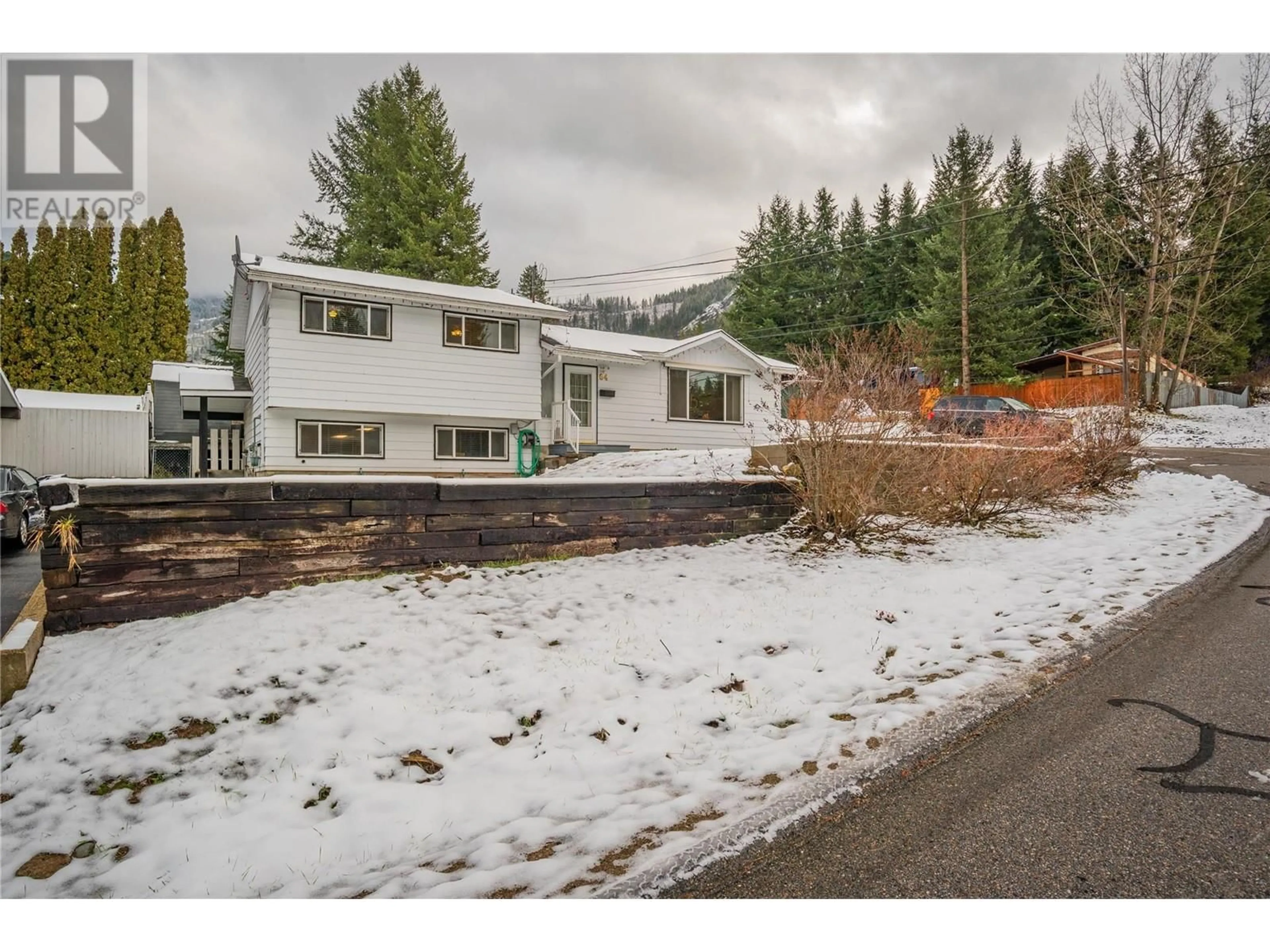 Frontside or backside of a home, the street view for 64 Moller Road, Fruitvale British Columbia V0G1L0