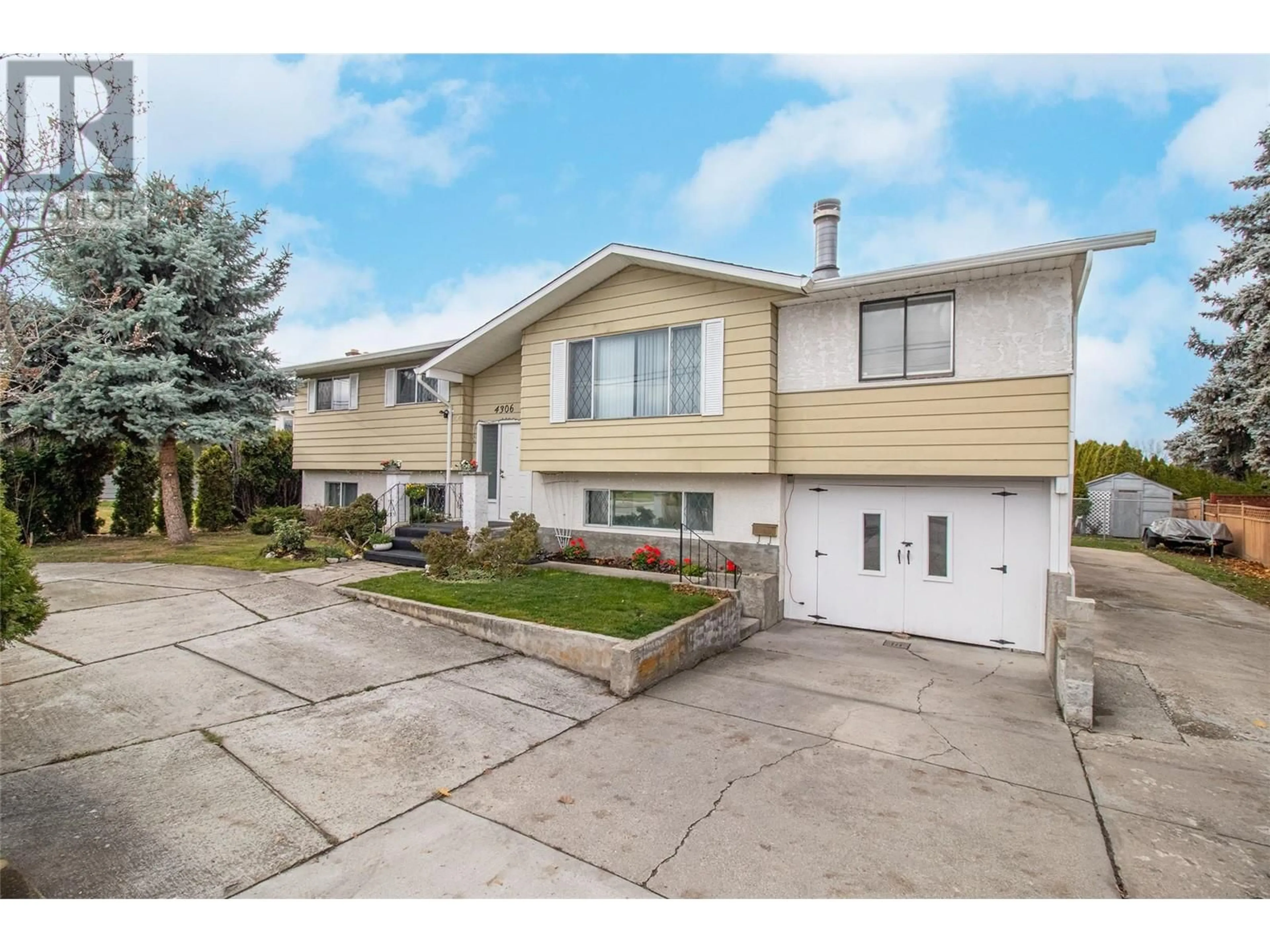 Frontside or backside of a home for 4306 Gordon Drive, Kelowna British Columbia V1W2L3