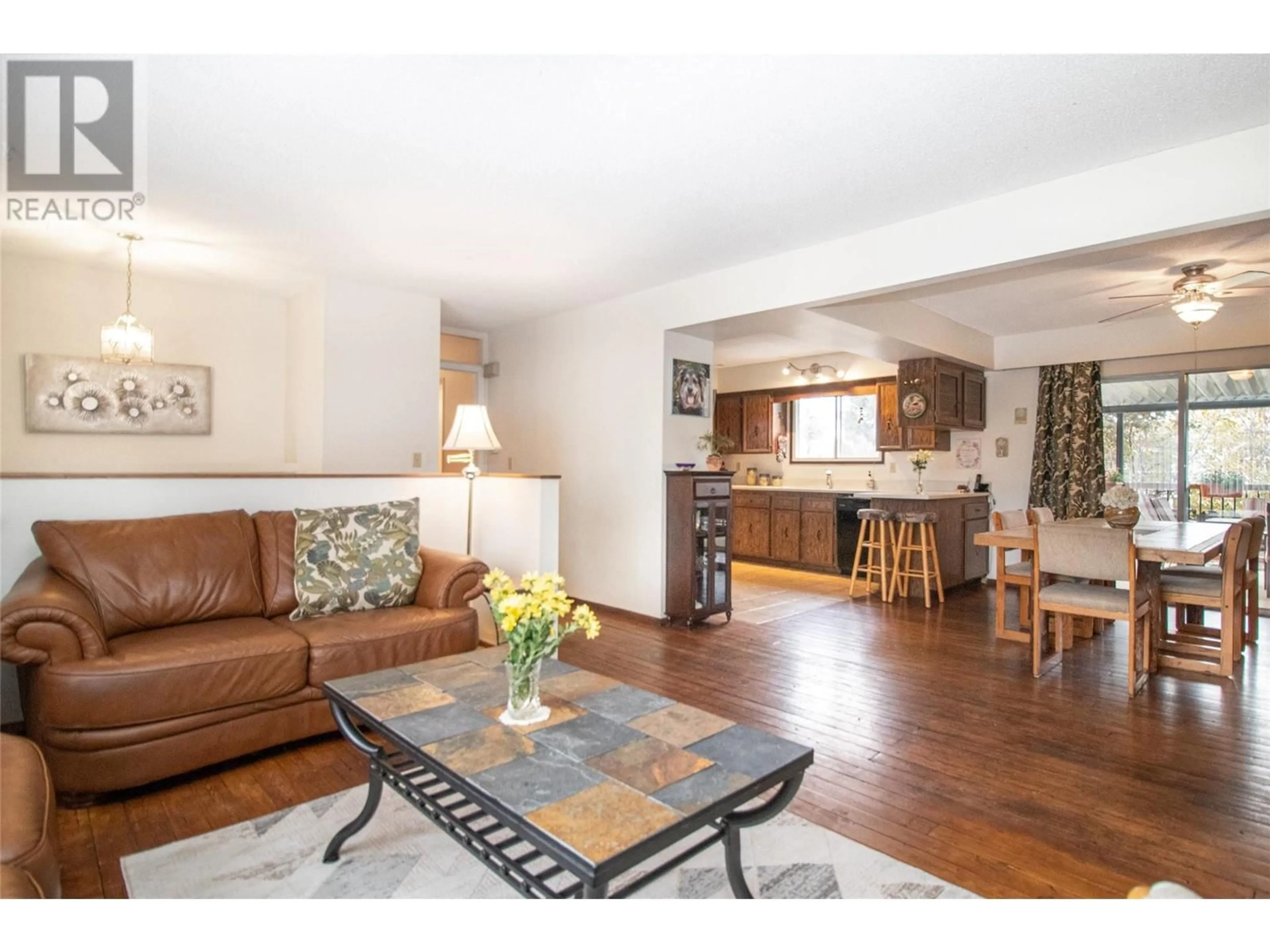 Living room, wood floors for 4306 Gordon Drive, Kelowna British Columbia V1W2L3