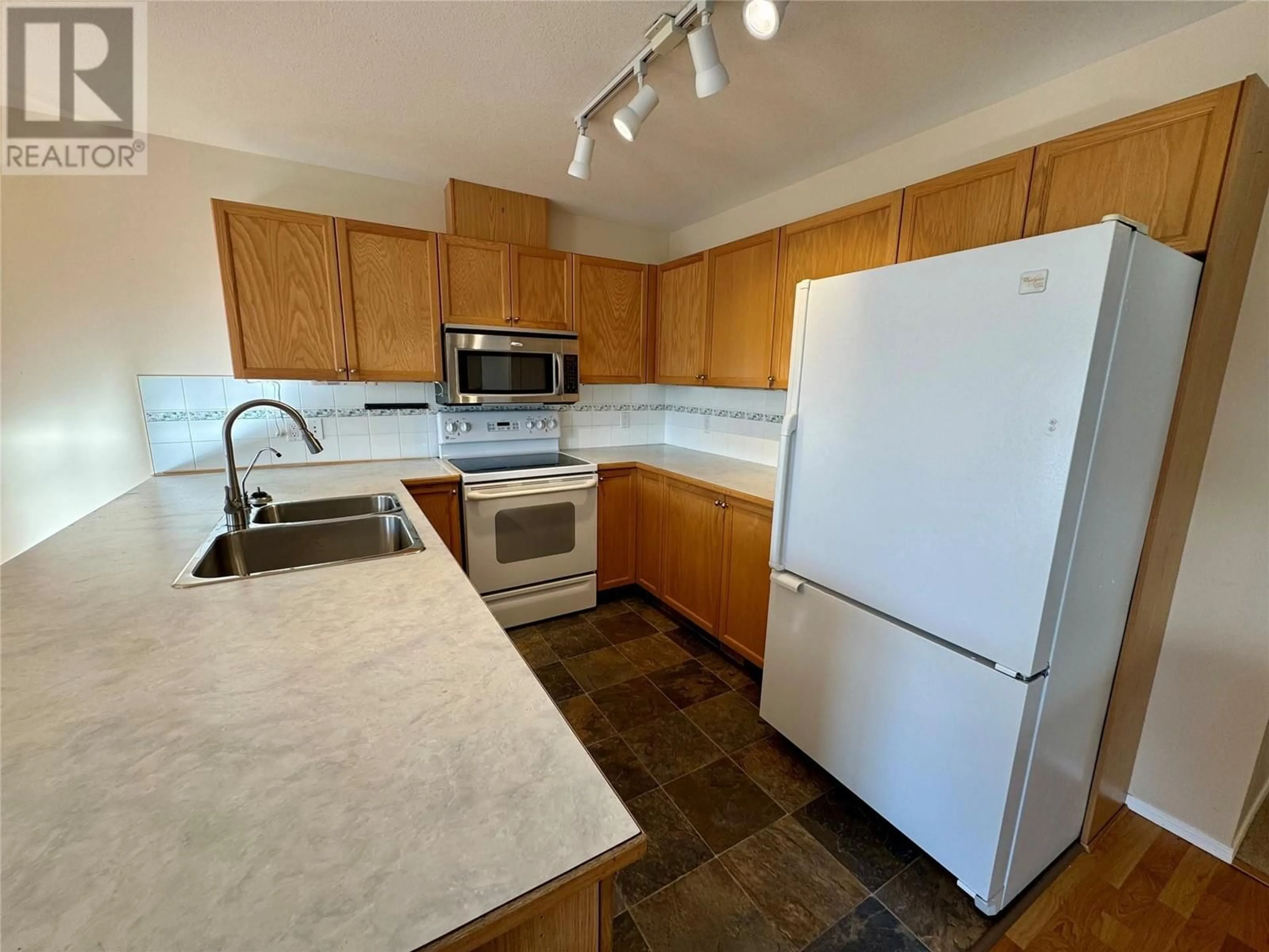 Standard kitchen, wood floors for 15B WOLF Crescent, Invermere British Columbia V0A1K2