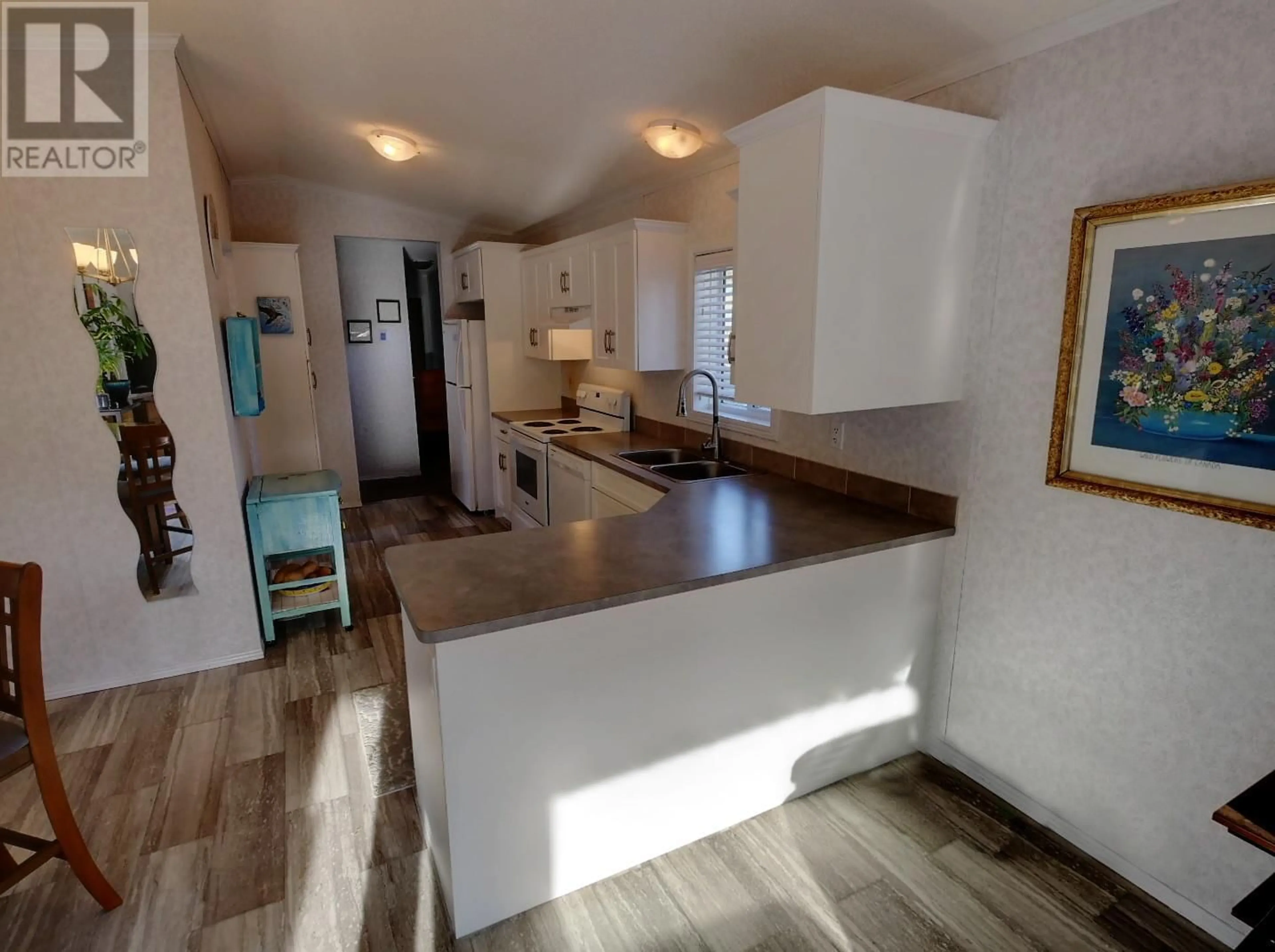 Kitchen, wood floors, cottage for 244 E Avenue Unit# 2, Kaslo British Columbia V0G1M0