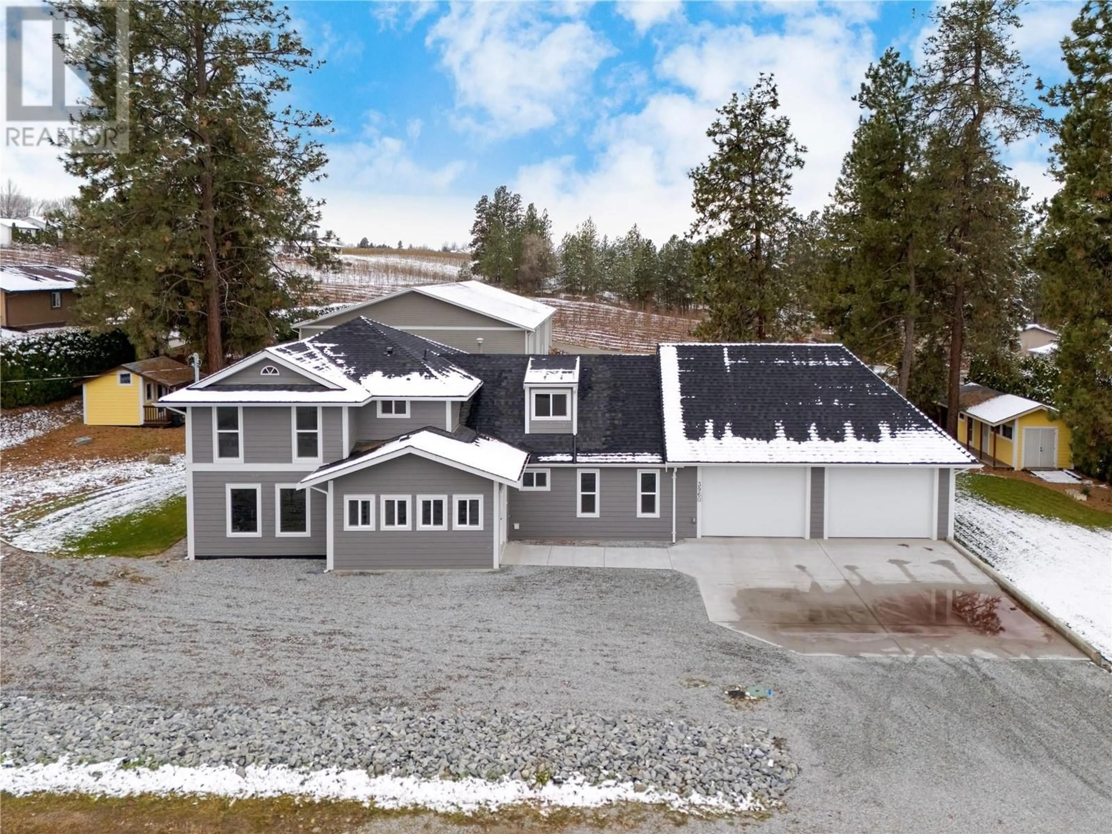 Frontside or backside of a home, cottage for 3960 June Springs Road, Kelowna British Columbia V1W4E4