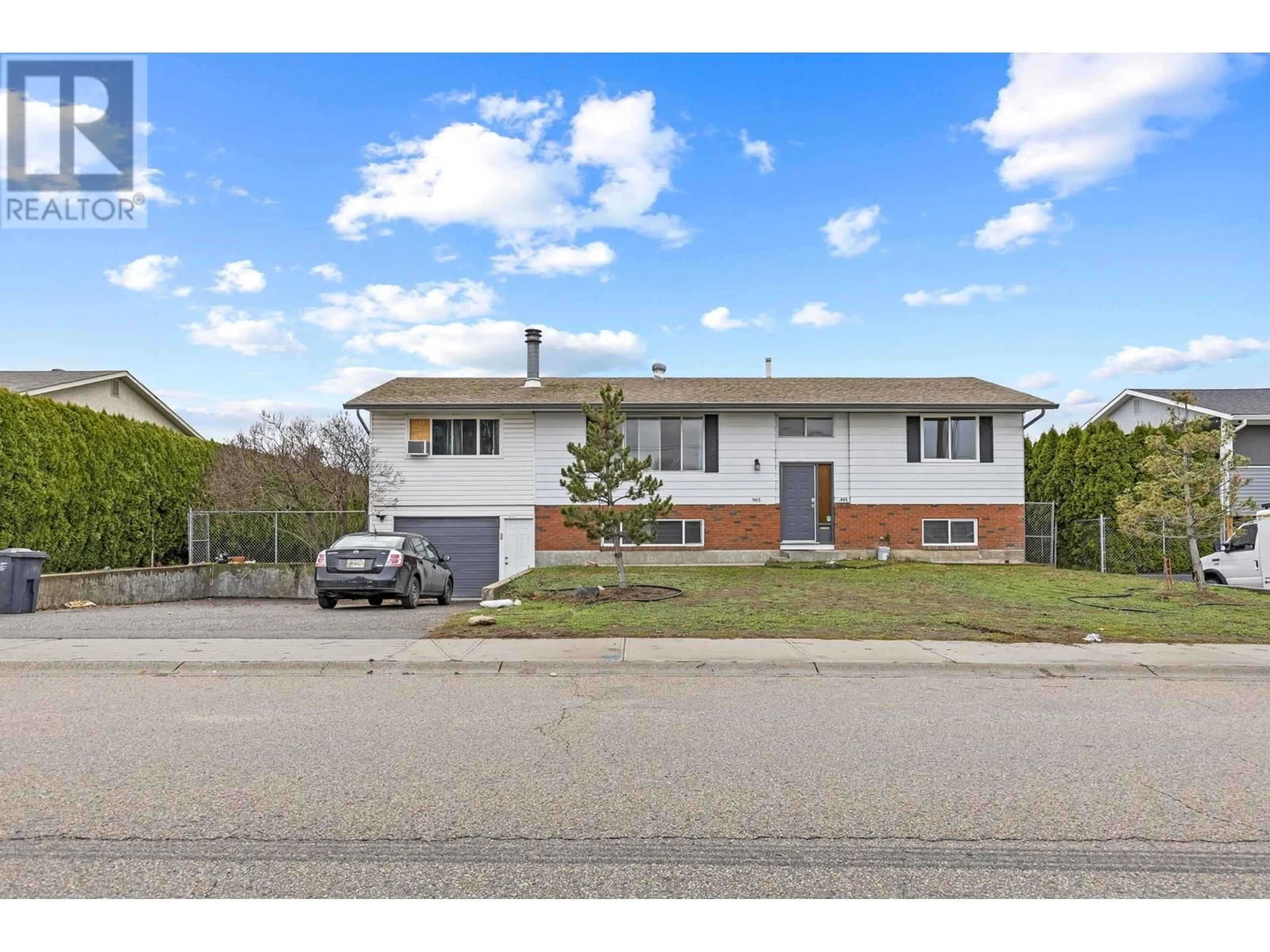 Frontside or backside of a home, the street view for 965 Graham Rd Road, Kelowna British Columbia V1X5X4