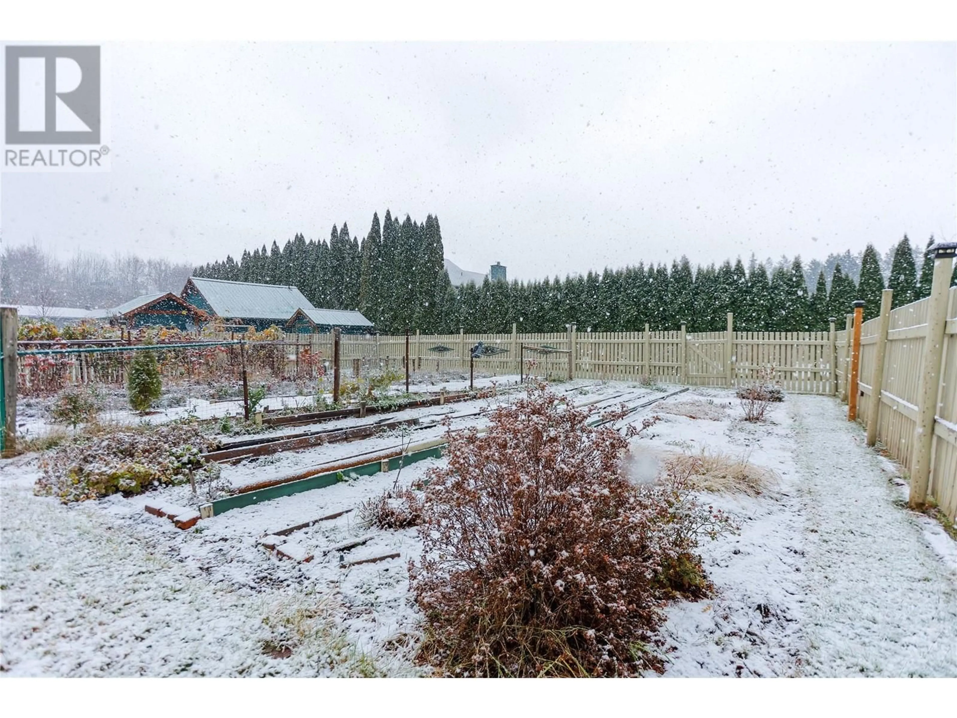 Patio, the fenced backyard for 516 7TH Street, Kaslo British Columbia V0G1M0