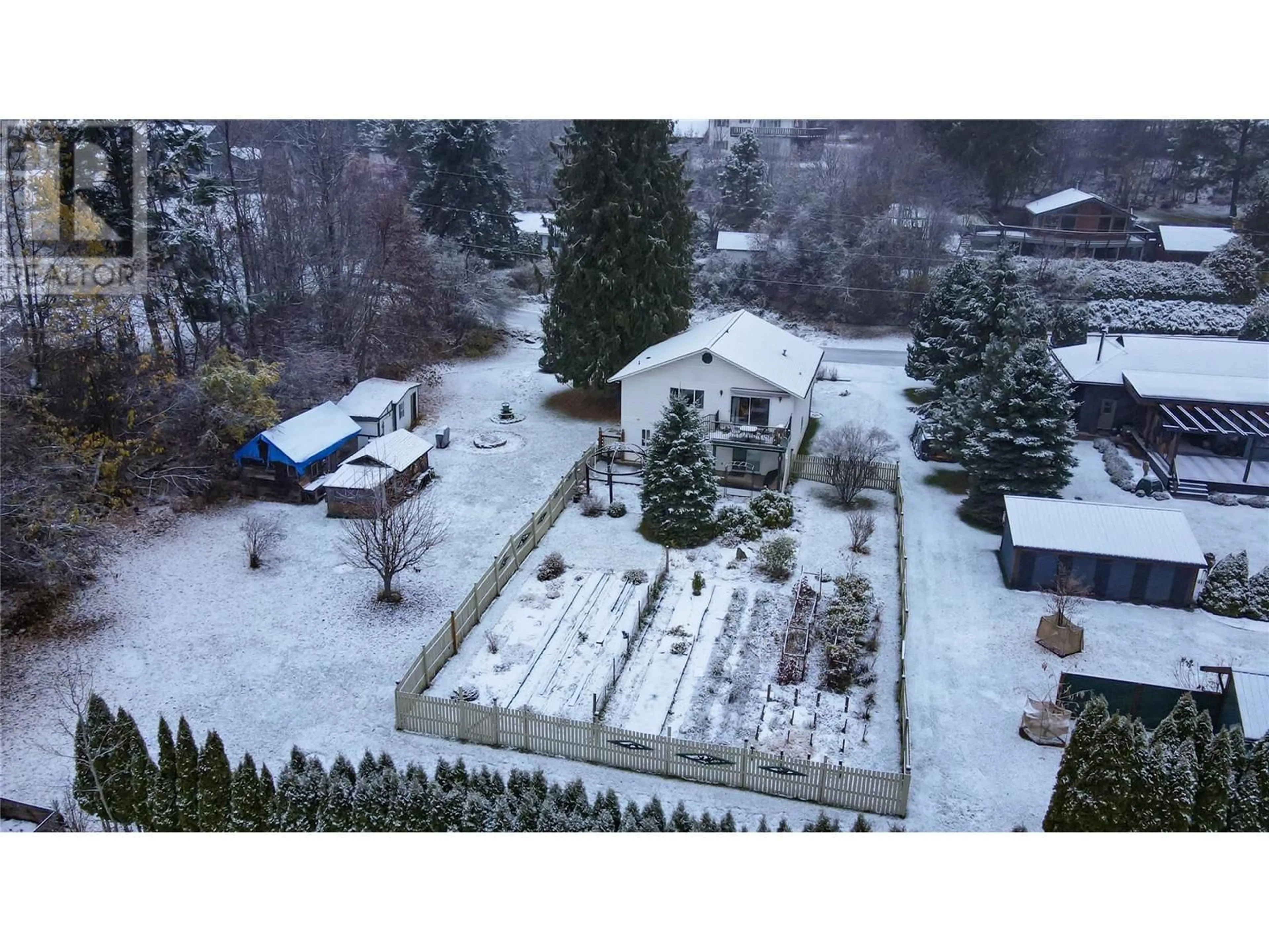 Patio, the fenced backyard for 516 7TH Street, Kaslo British Columbia V0G1M0