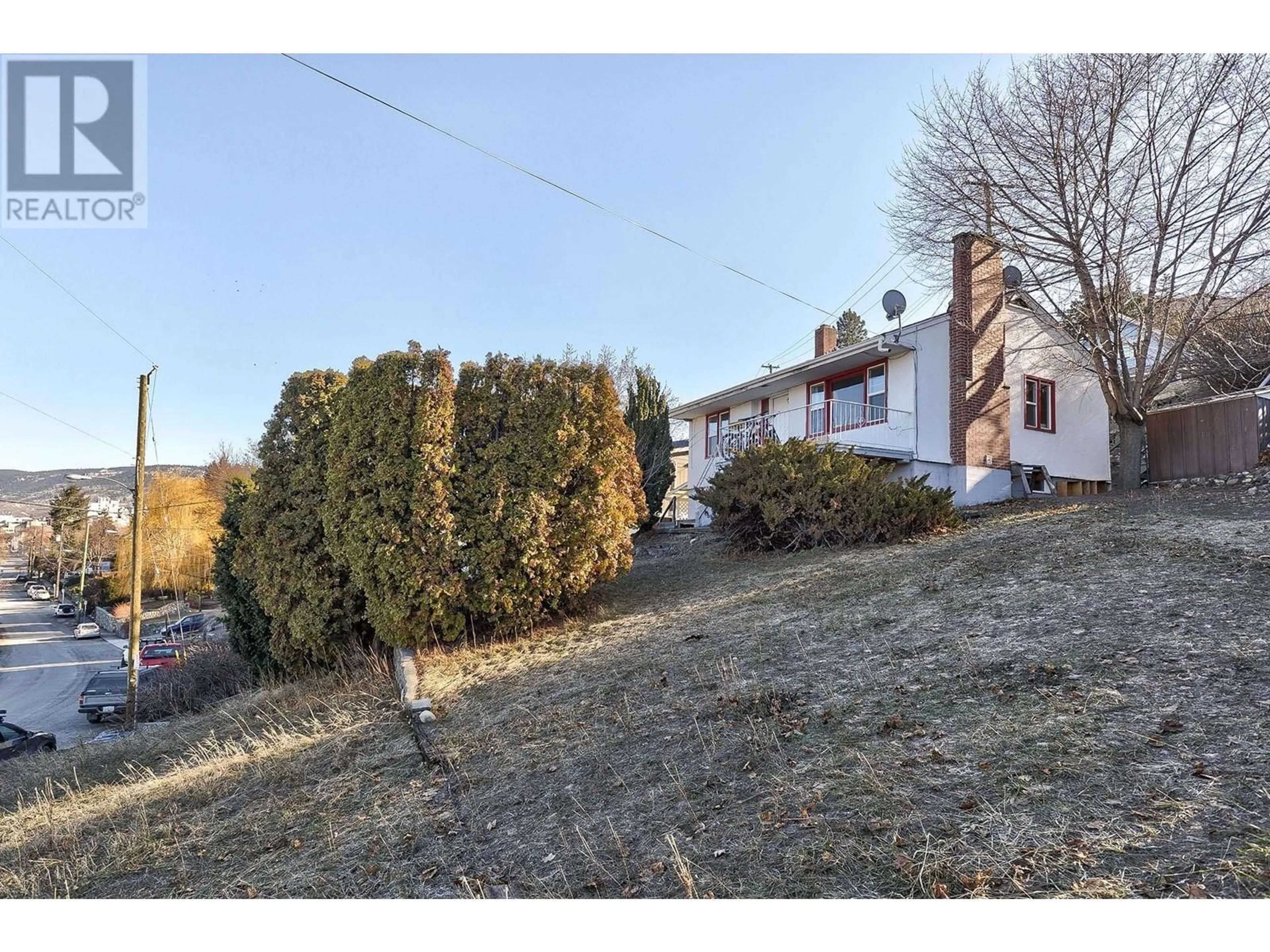 Frontside or backside of a home, the fenced backyard for 263 SEYMOUR  W Street, Kamloops British Columbia V2C1E8