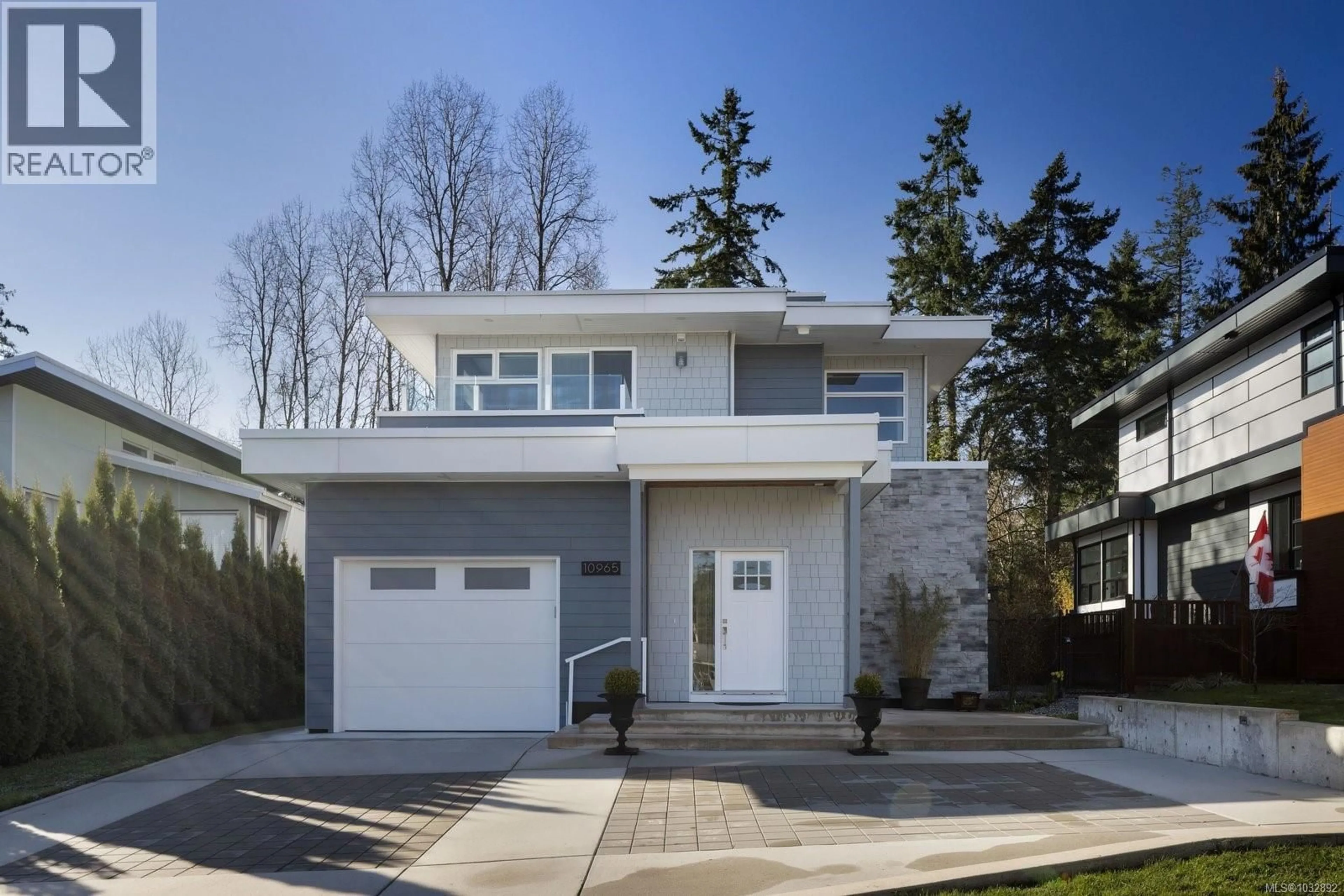 Home with vinyl exterior material, street for 10965 MADRONA DRIVE, North Saanich British Columbia V8L5R7