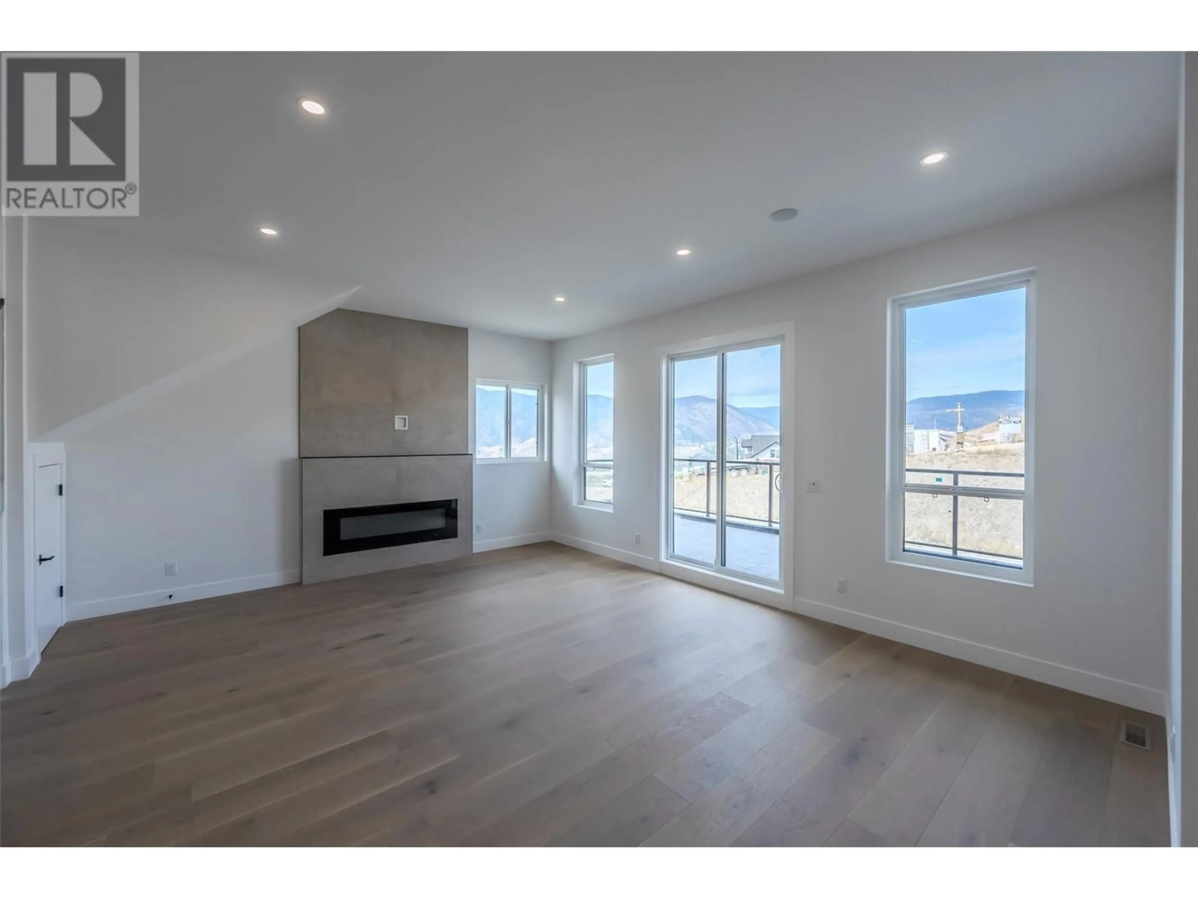 A pic of a room, wood floors for 3304 EVERGREEN Drive, Penticton British Columbia V2A9A9