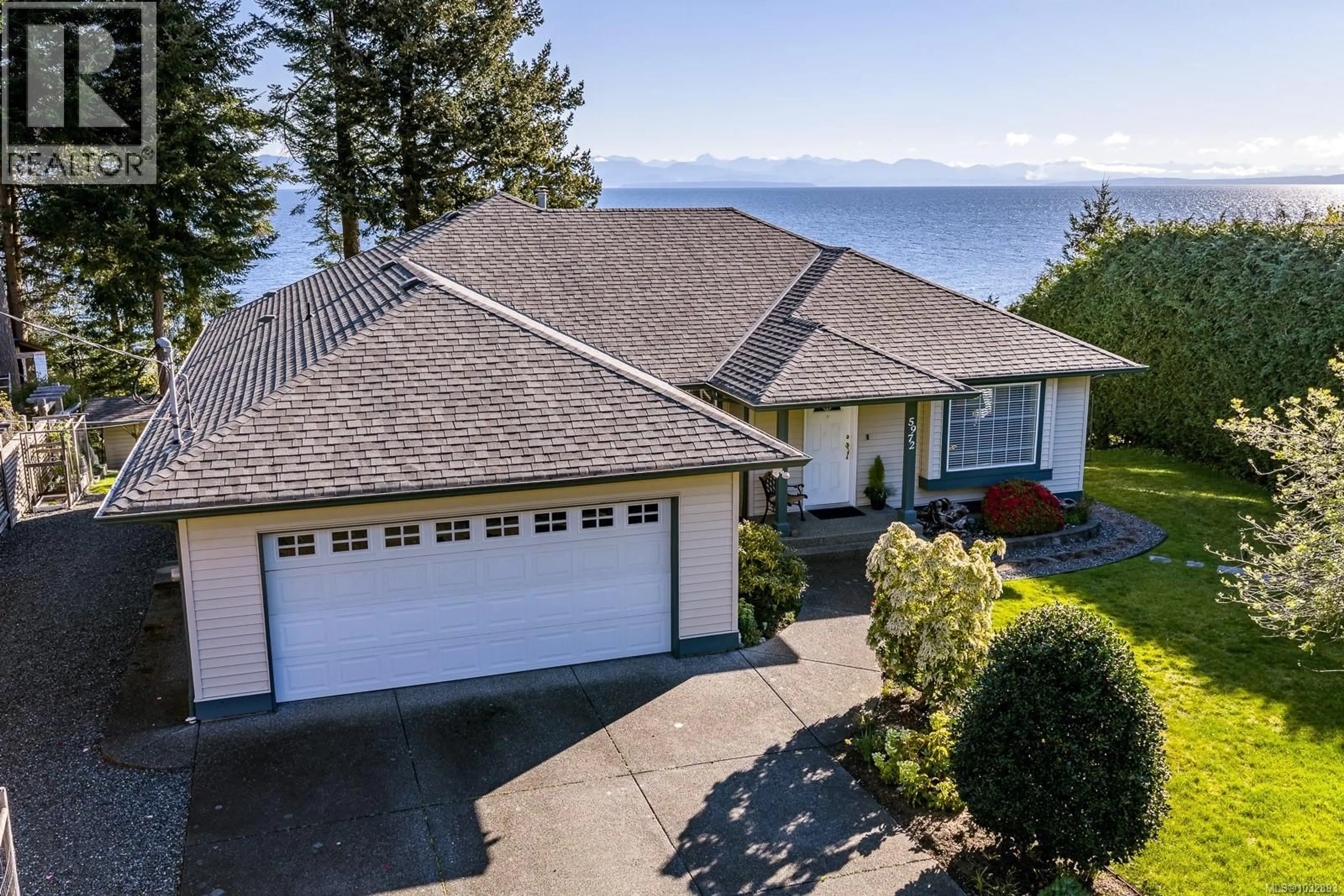 A pic from outside/outdoor area/front of a property/back of a property/a pic from drone, water/lake/river/ocean view for 5972 ALDERGROVE DRIVE, Courtenay British Columbia V9J1W2