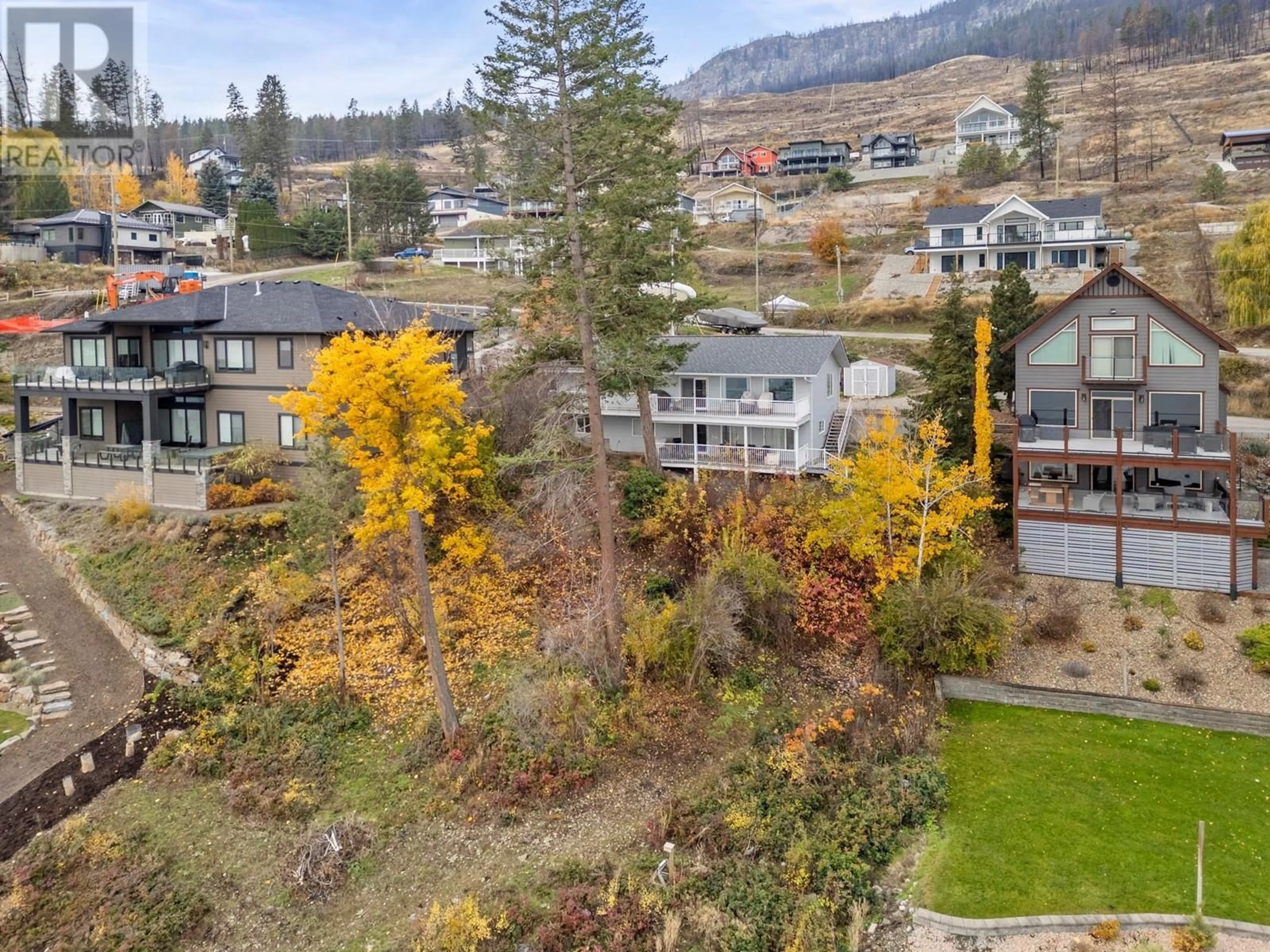 A pic from outside/outdoor area/front of a property/back of a property/a pic from drone, mountain view for 19 NERIE ROAD, Vernon British Columbia V1H2E4