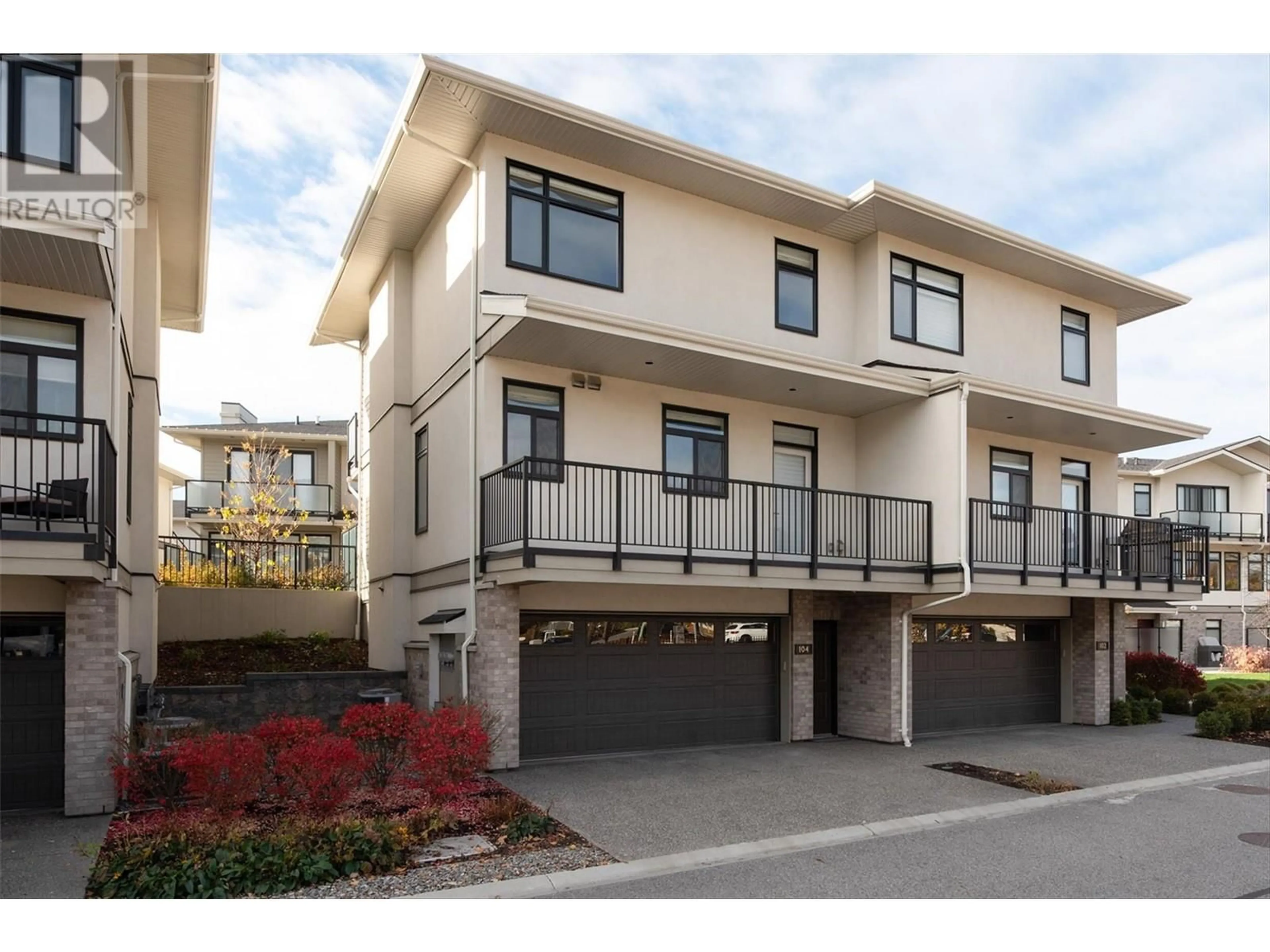 A pic from exterior of the house or condo for 1102 Cameron Avenue Unit# 104, Kelowna British Columbia V1Y0B2