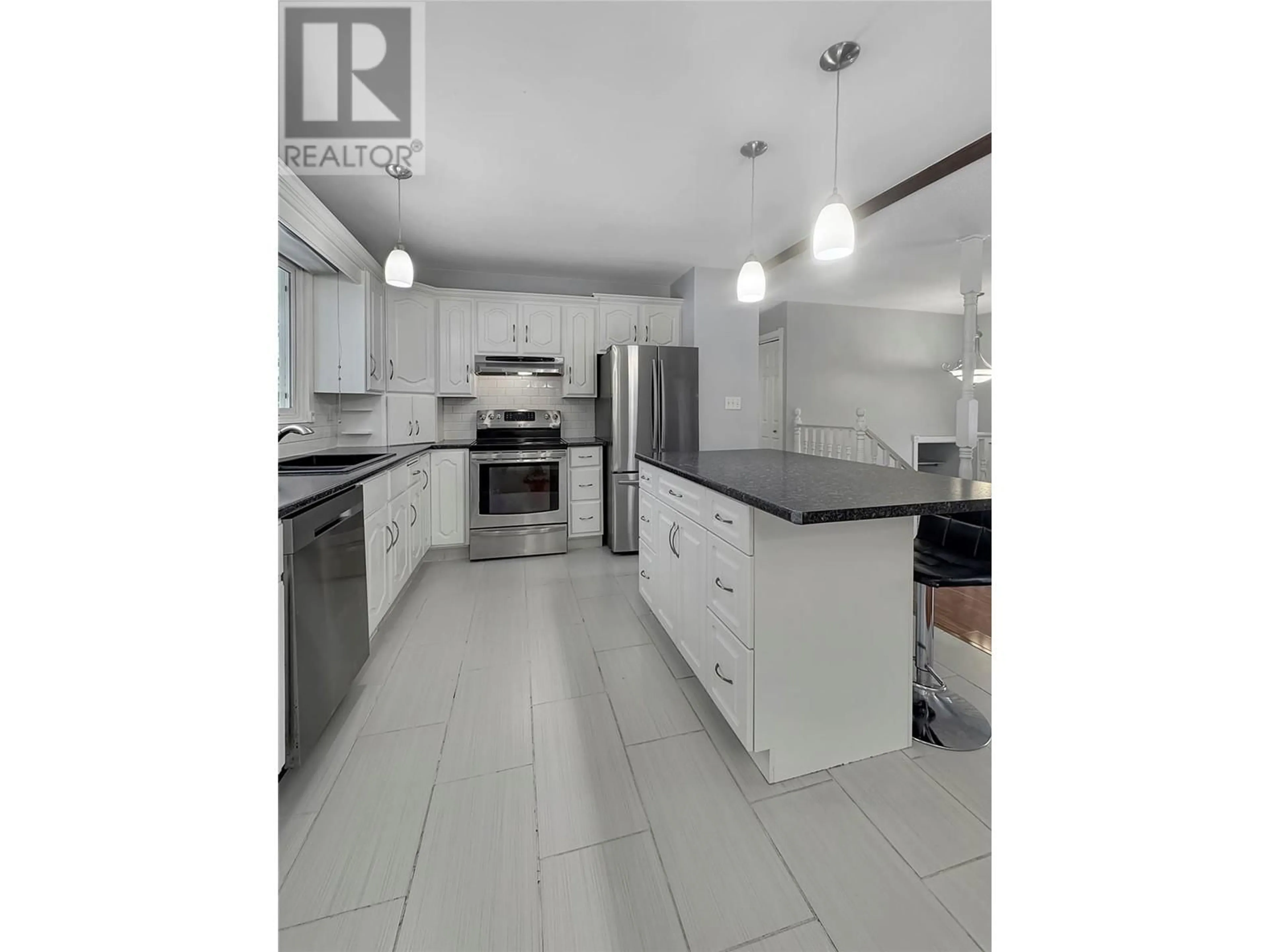 Open concept kitchen, ceramic/tile floor for 19 21ST Avenue S, Cranbrook British Columbia V1C3H2