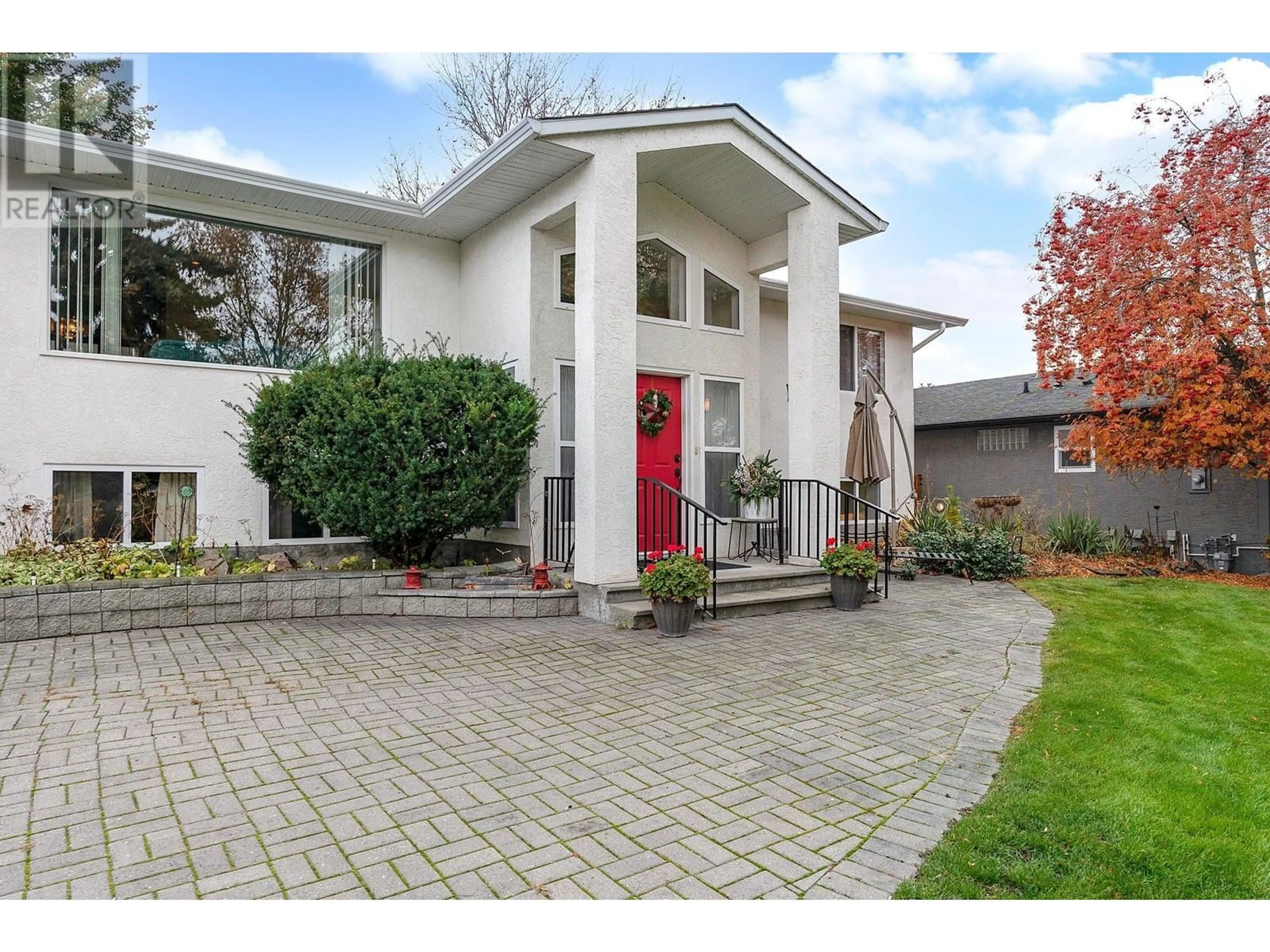 Frontside or backside of a home, the street view for 961 Valley Road Lot# 6, Kelowna British Columbia V1Y4S6