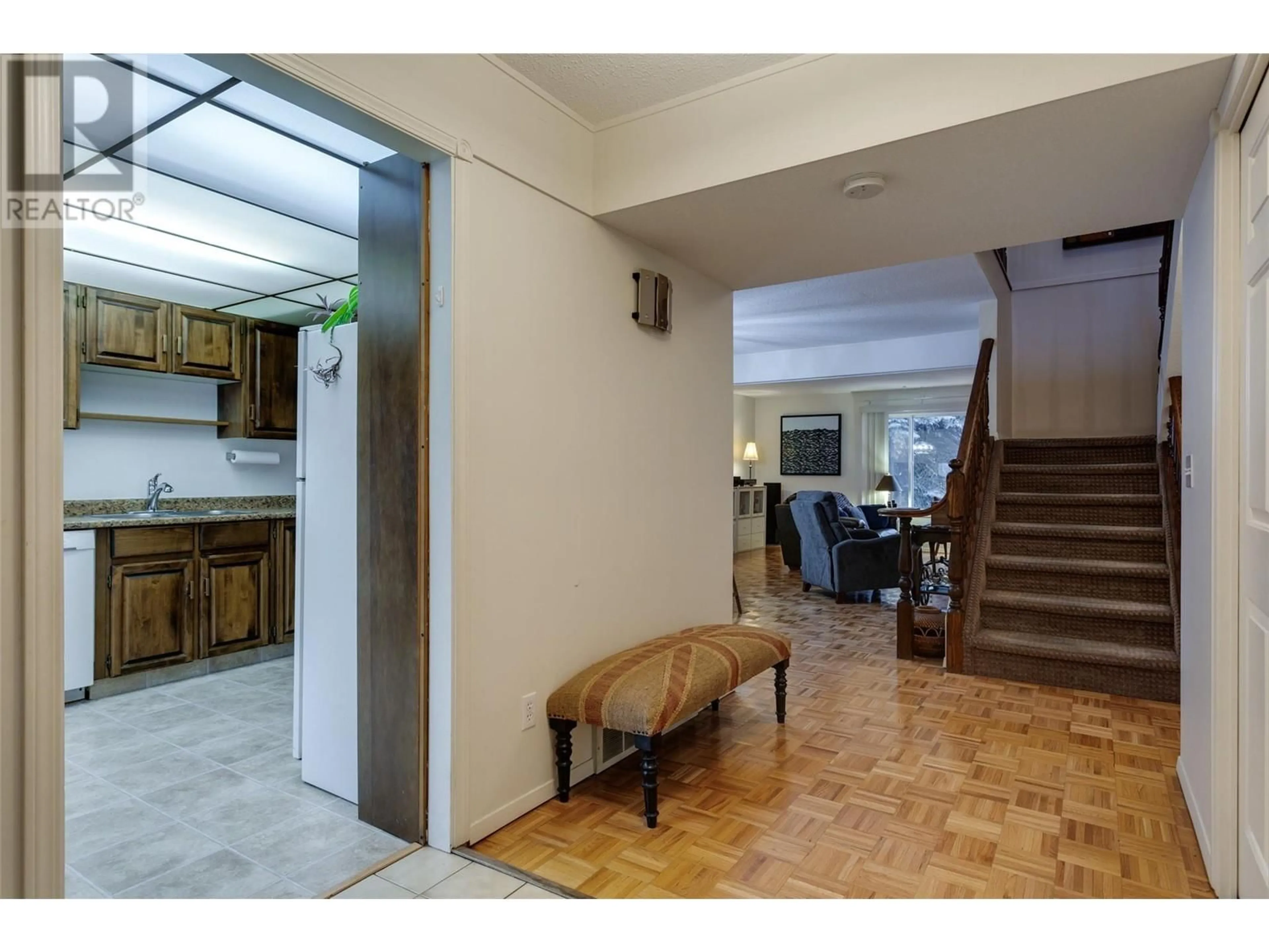 Indoor foyer, wood floors for 1675 Thayer Court Unit# 11, Kelowna British Columbia V1Y8M2