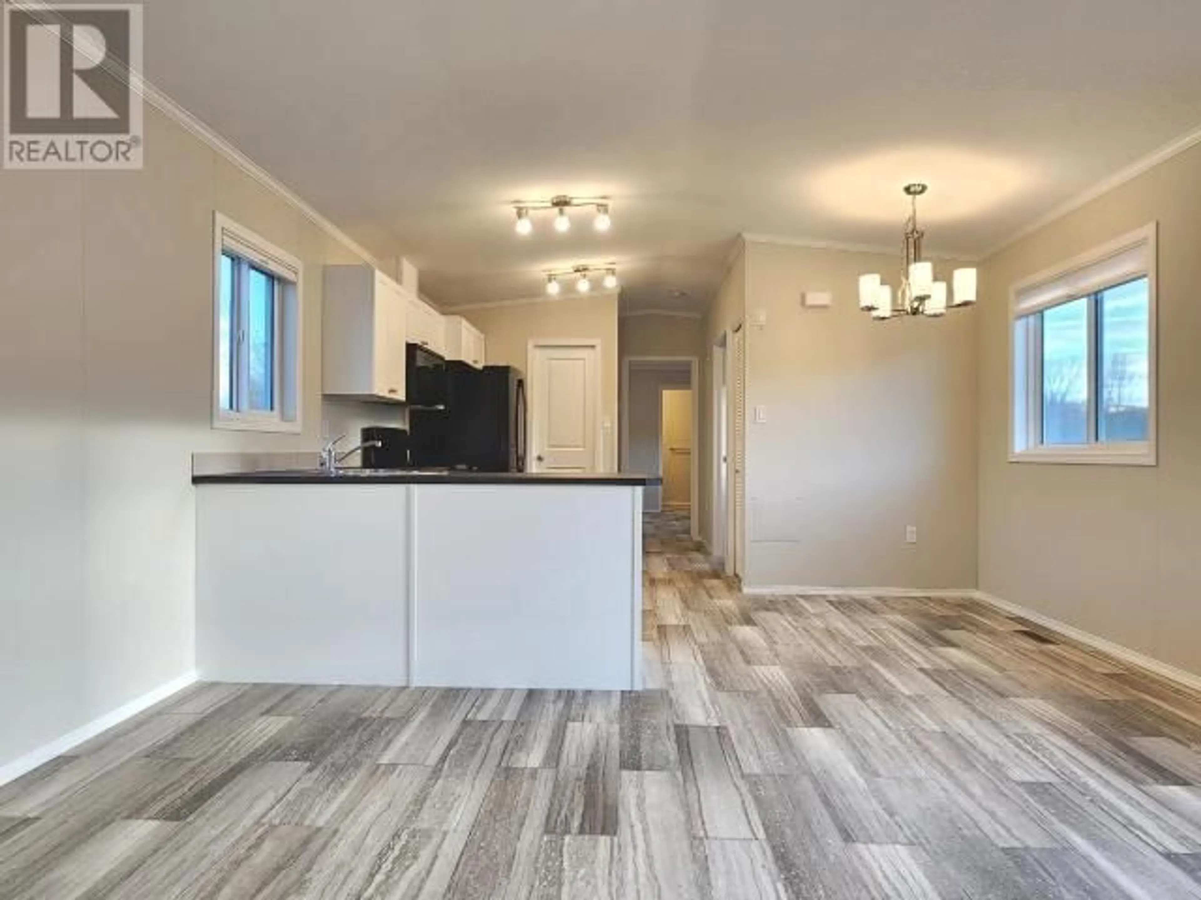 Open concept kitchen for 1620 STAGE Road Unit# 9, Cache Creek British Columbia V0K1H0