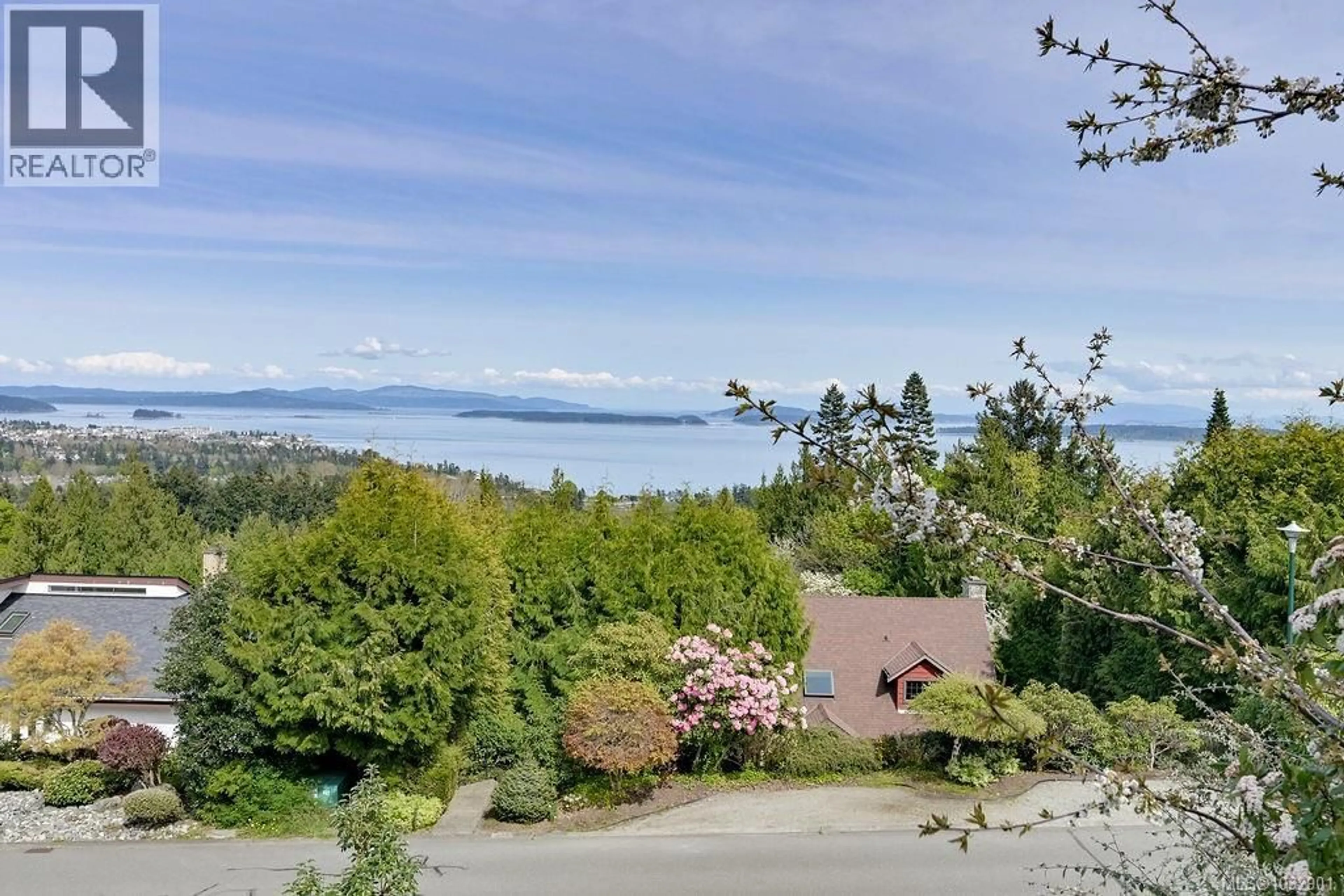 A pic from outside/outdoor area/front of a property/back of a property/a pic from drone, water/lake/river/ocean view for 8870 FOREST PARK DRIVE, North Saanich British Columbia V8L4E9