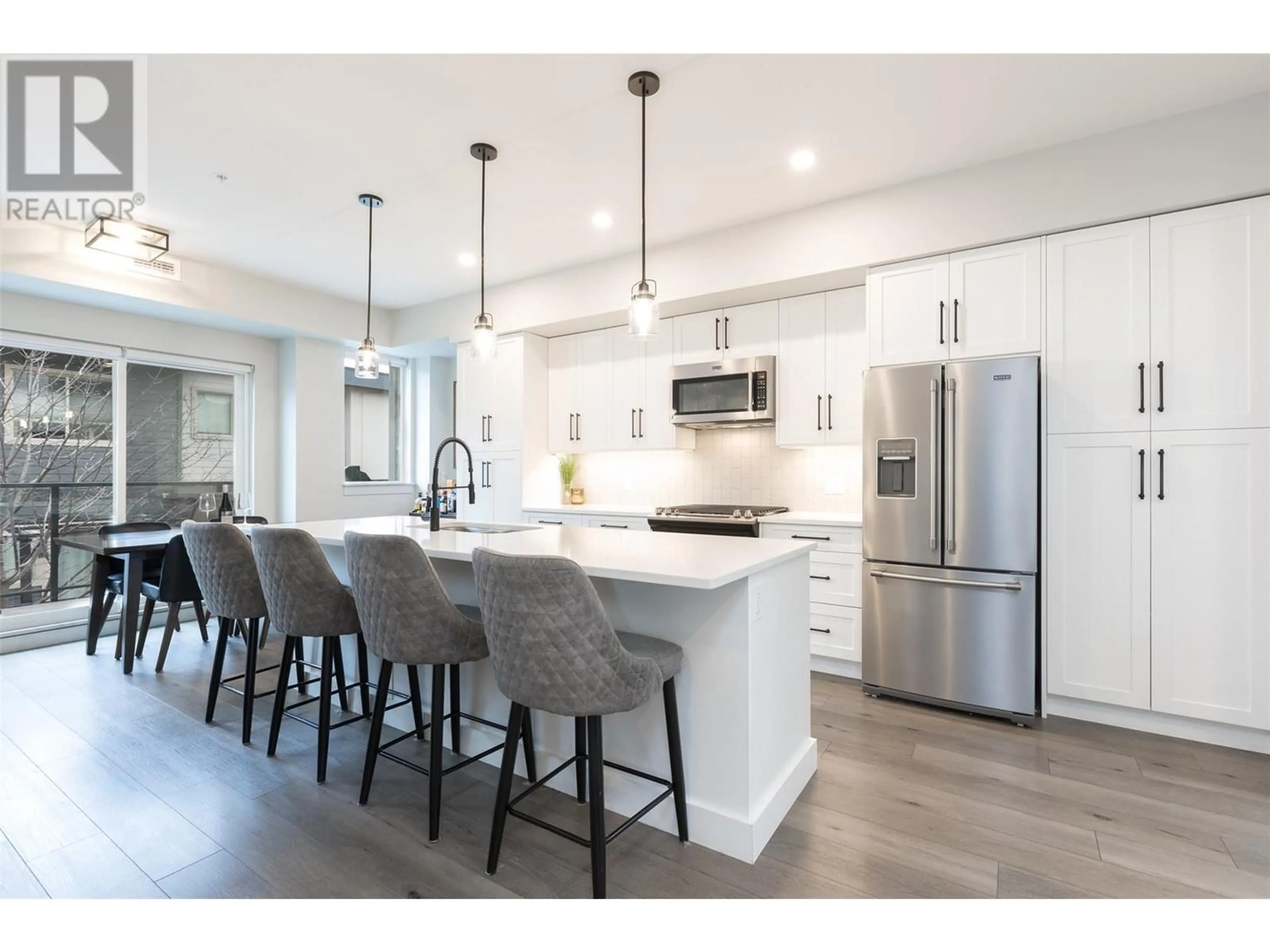 Open concept kitchen for 3630 Mission Springs Drive Unit# 109, Kelowna British Columbia V1W0B2