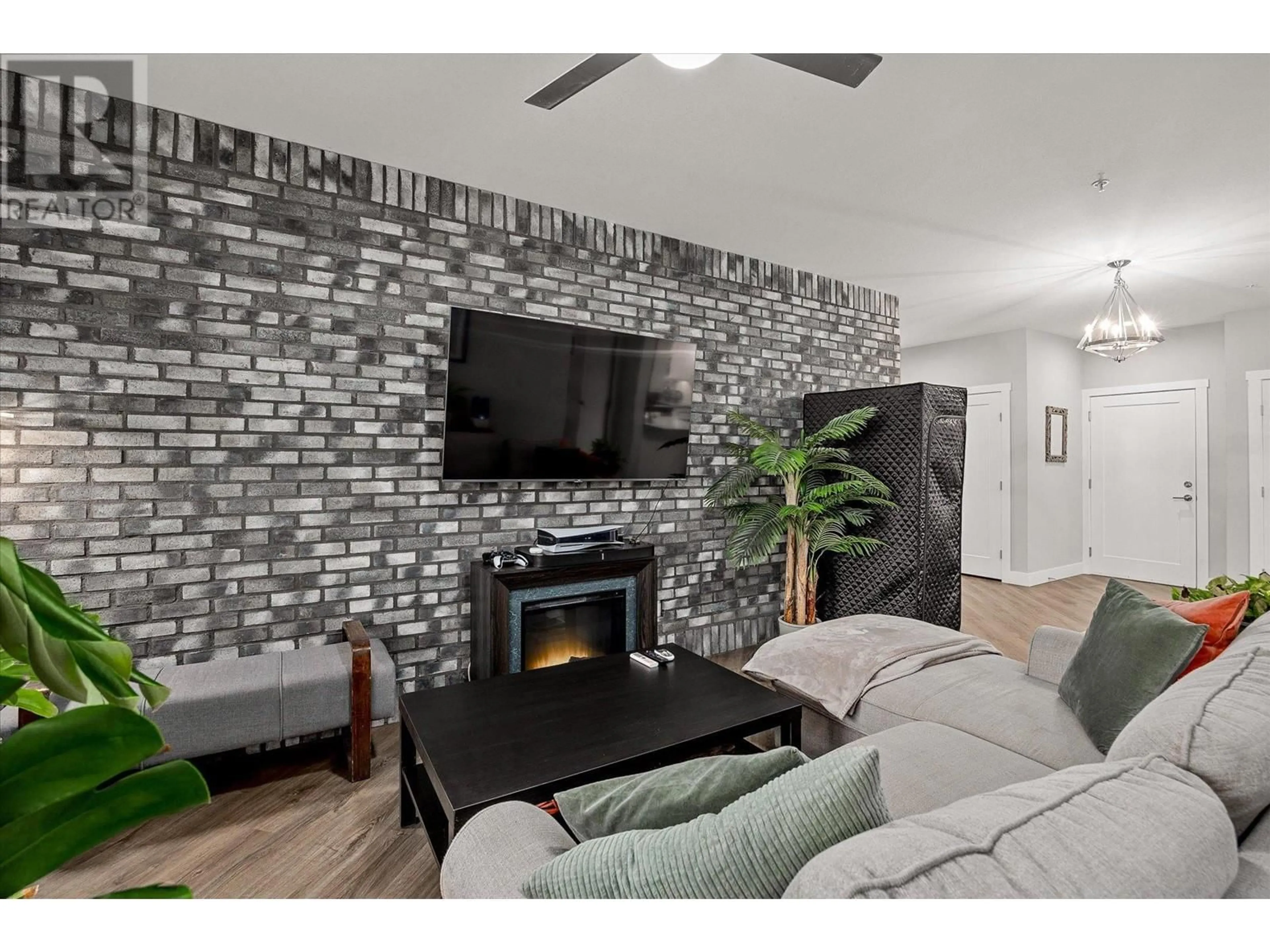 Living room with furniture, unknown for 216 - 3090 BURTCH ROAD, Kelowna British Columbia V1W5G9