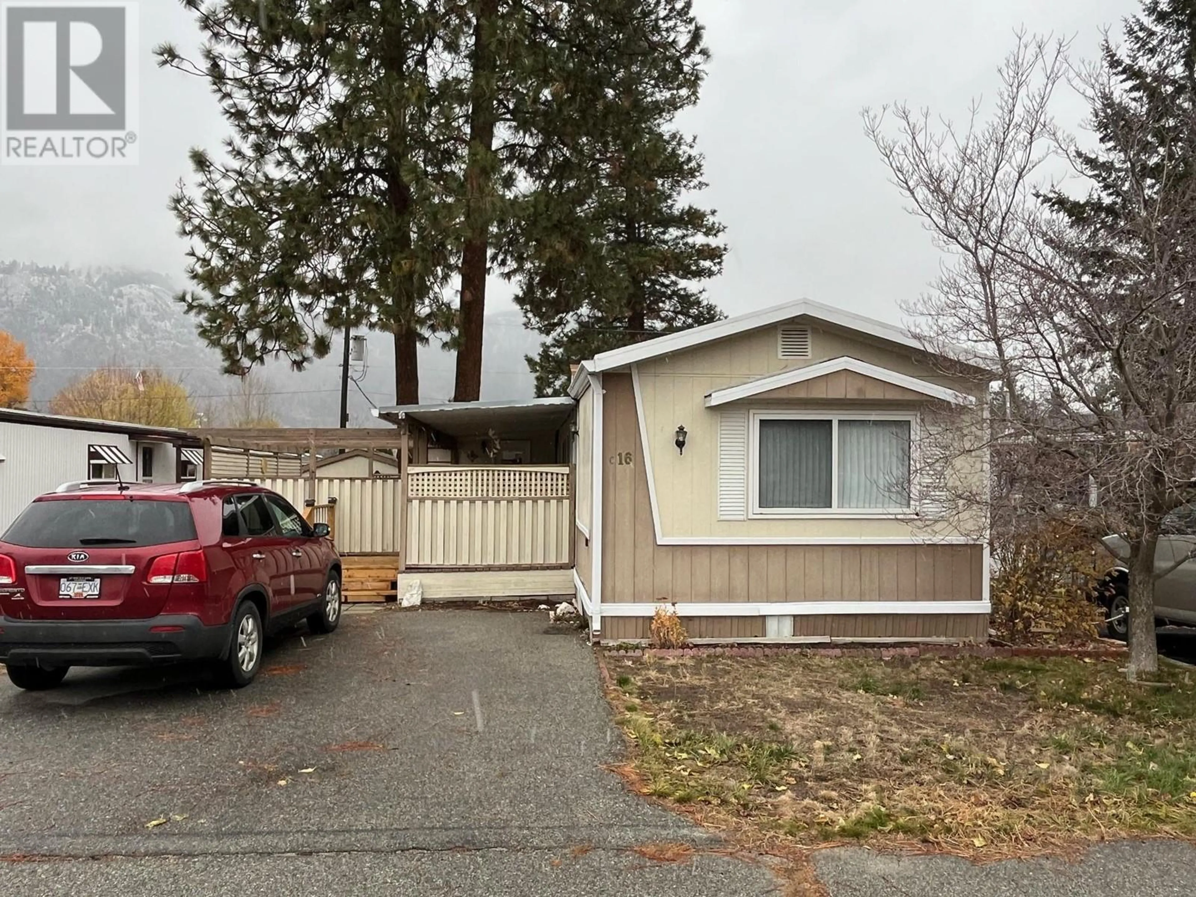 Home with vinyl exterior material, street for C16 - 4505 MCLEAN CREEK ROAD, Okanagan Falls British Columbia V0H1R1