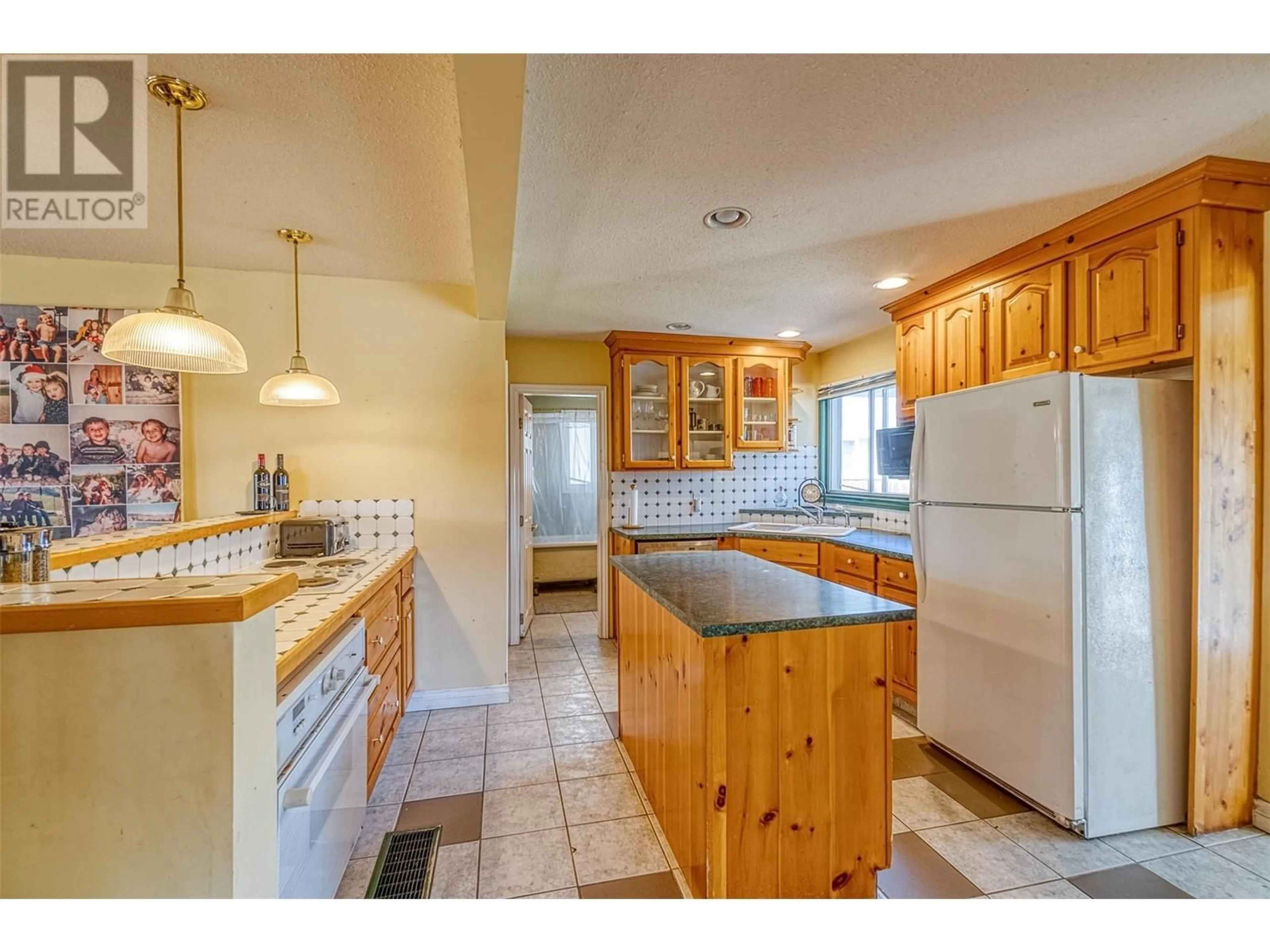 Kitchen, wood floors for 1967 Abbott Street, Kelowna British Columbia V1Y1B8