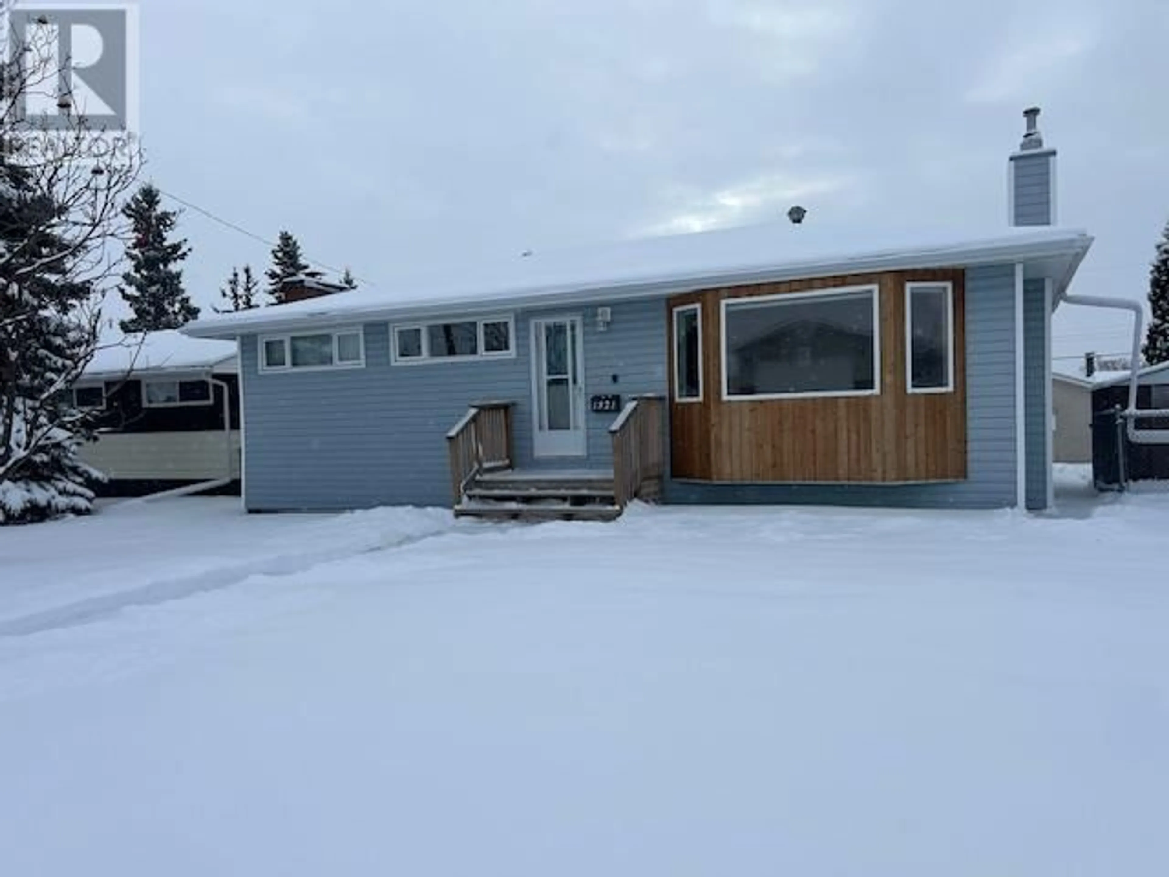 Frontside or backside of a home, the street view for 1321 92 Avenue, Dawson Creek British Columbia V1G1C4