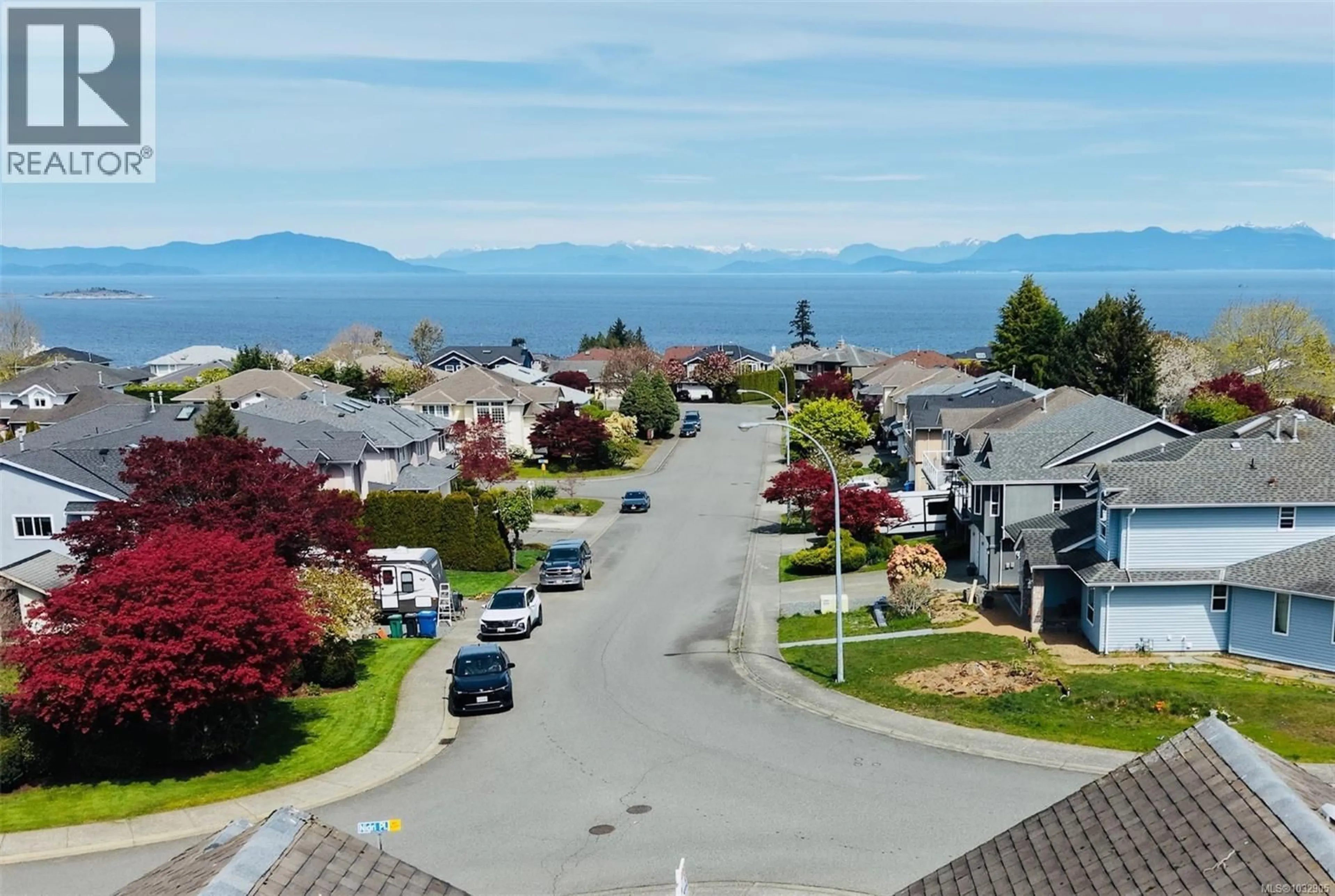 A pic from outside/outdoor area/front of a property/back of a property/a pic from drone, mountain view for 6404 LASALLE ROAD, Nanaimo British Columbia V9V1N6