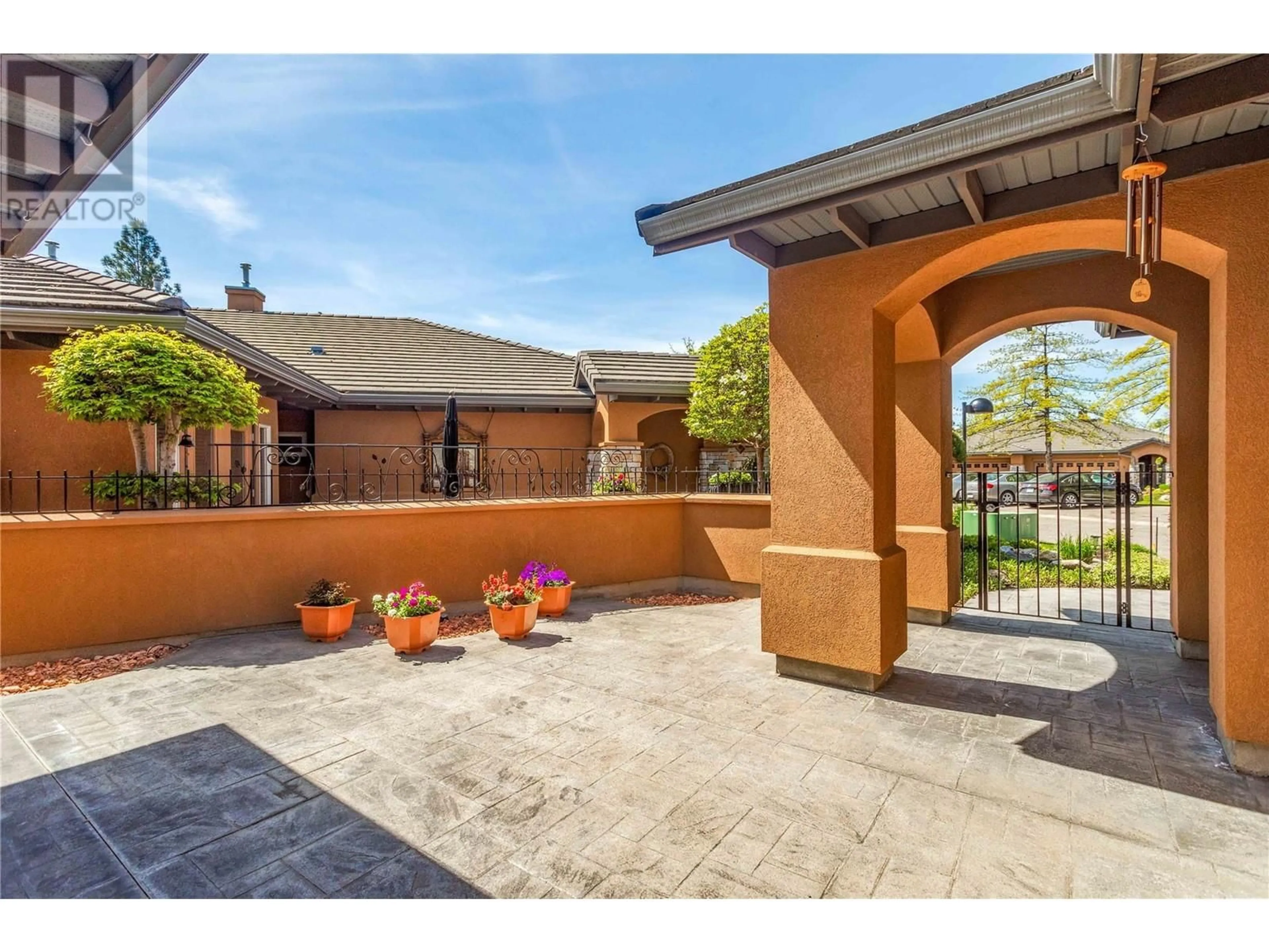 Patio, the fenced backyard for 4100 Gallaghers Parkland Drive Unit# 12, Kelowna British Columbia V1W3Z8