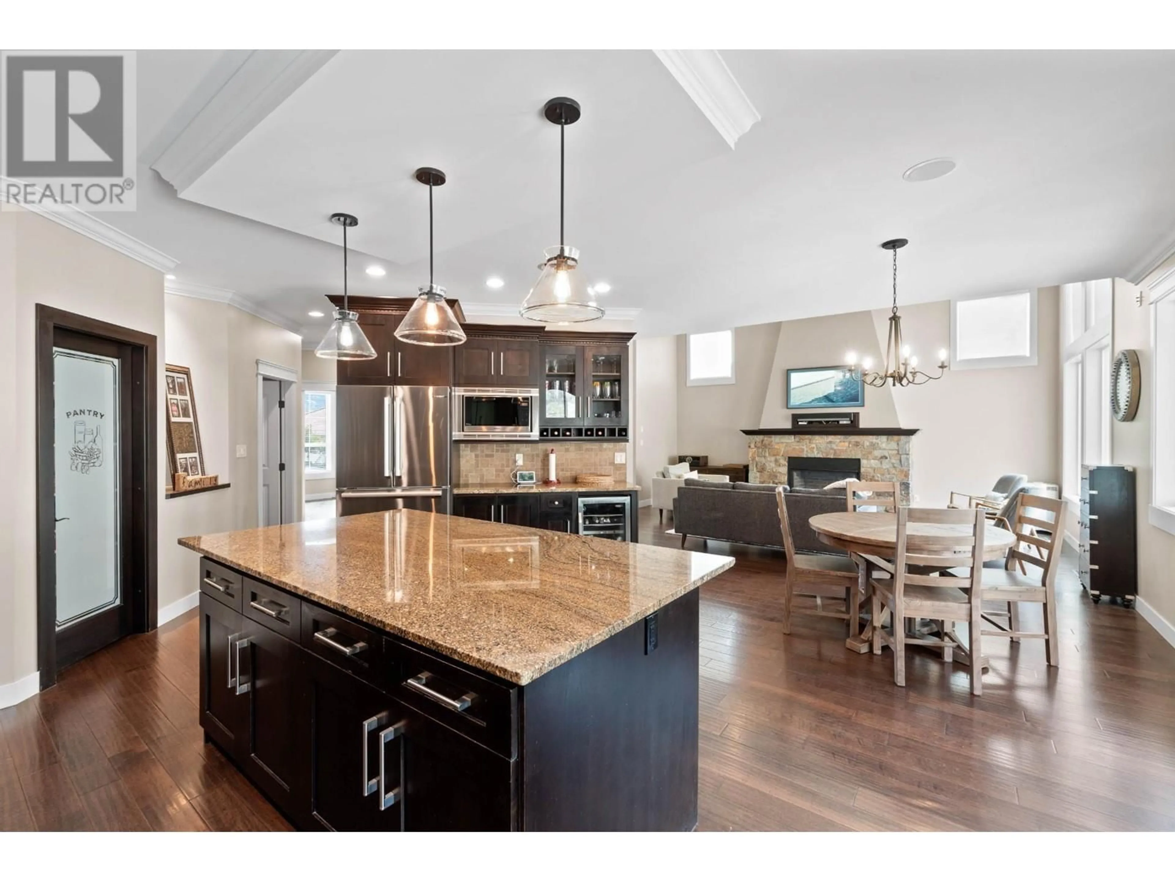 Open concept kitchen, wood/laminate floor for 3025 VISAO COURT, Kamloops British Columbia V2H0C6