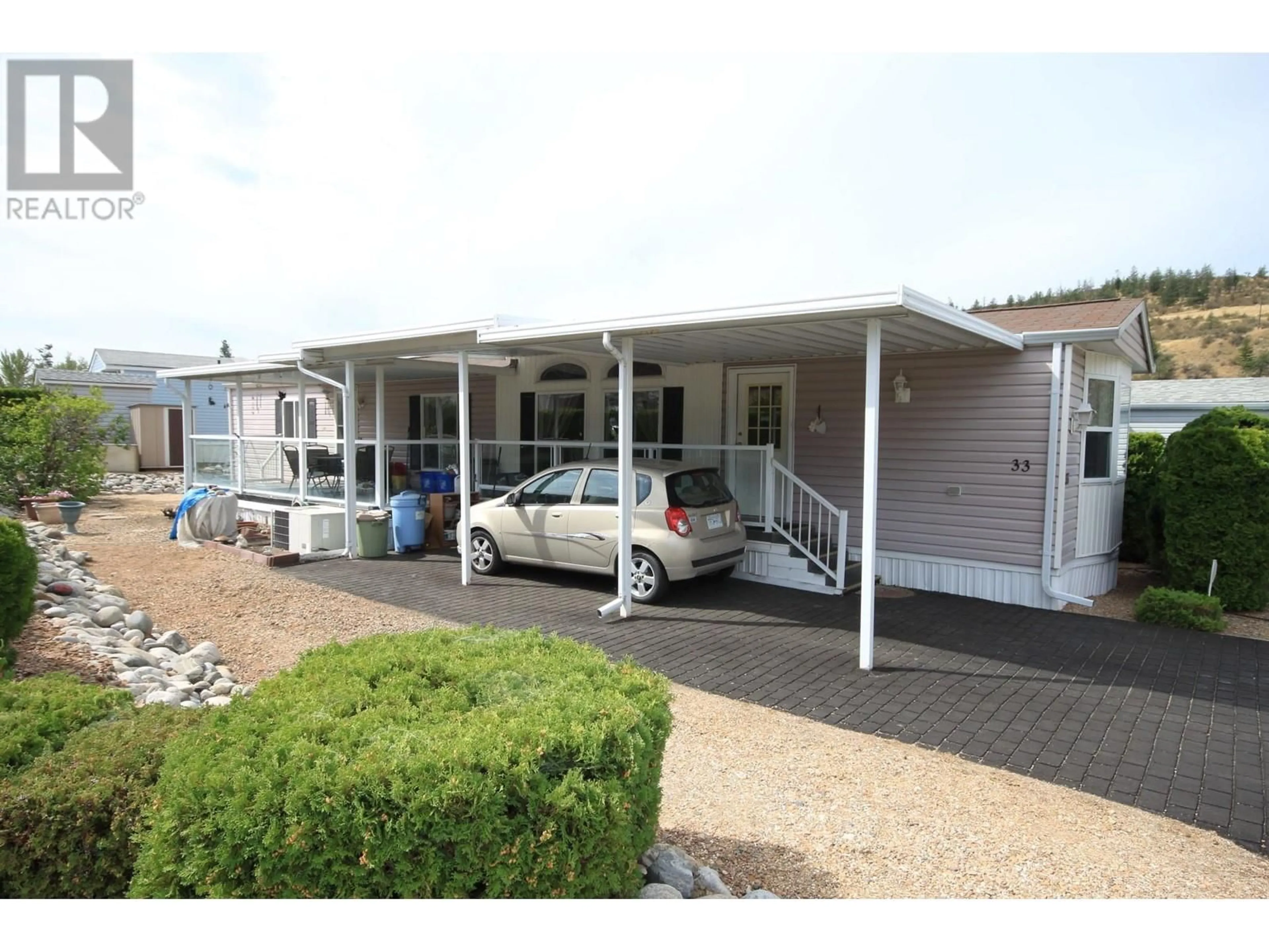 Home with vinyl exterior material for 33 - 8598 HWY 97 OTHER, Oliver British Columbia V0H1T2