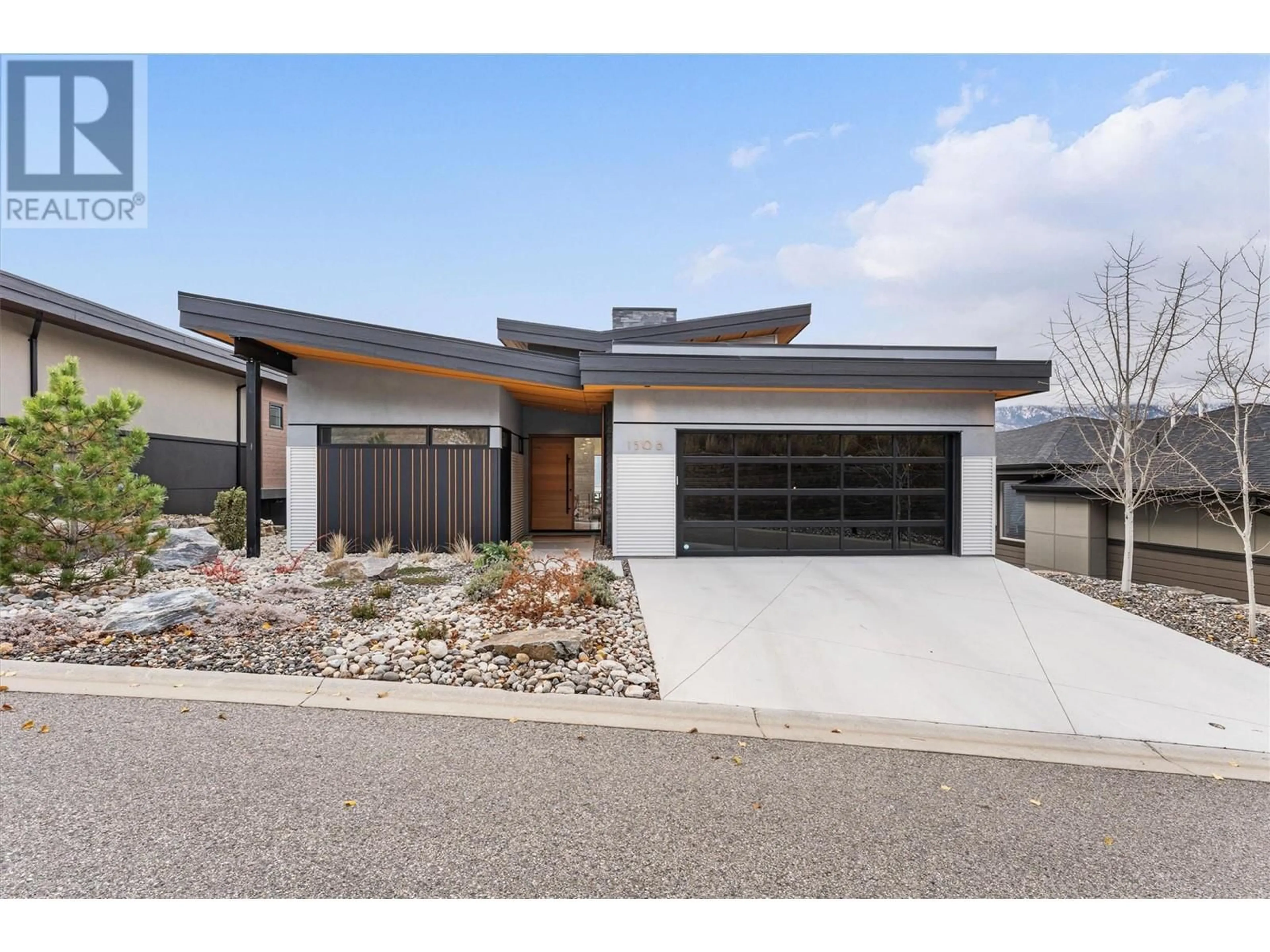 Home with brick exterior material, street for 1506 MARBLE LEDGE DRIVE, Lake Country British Columbia V4V2T4