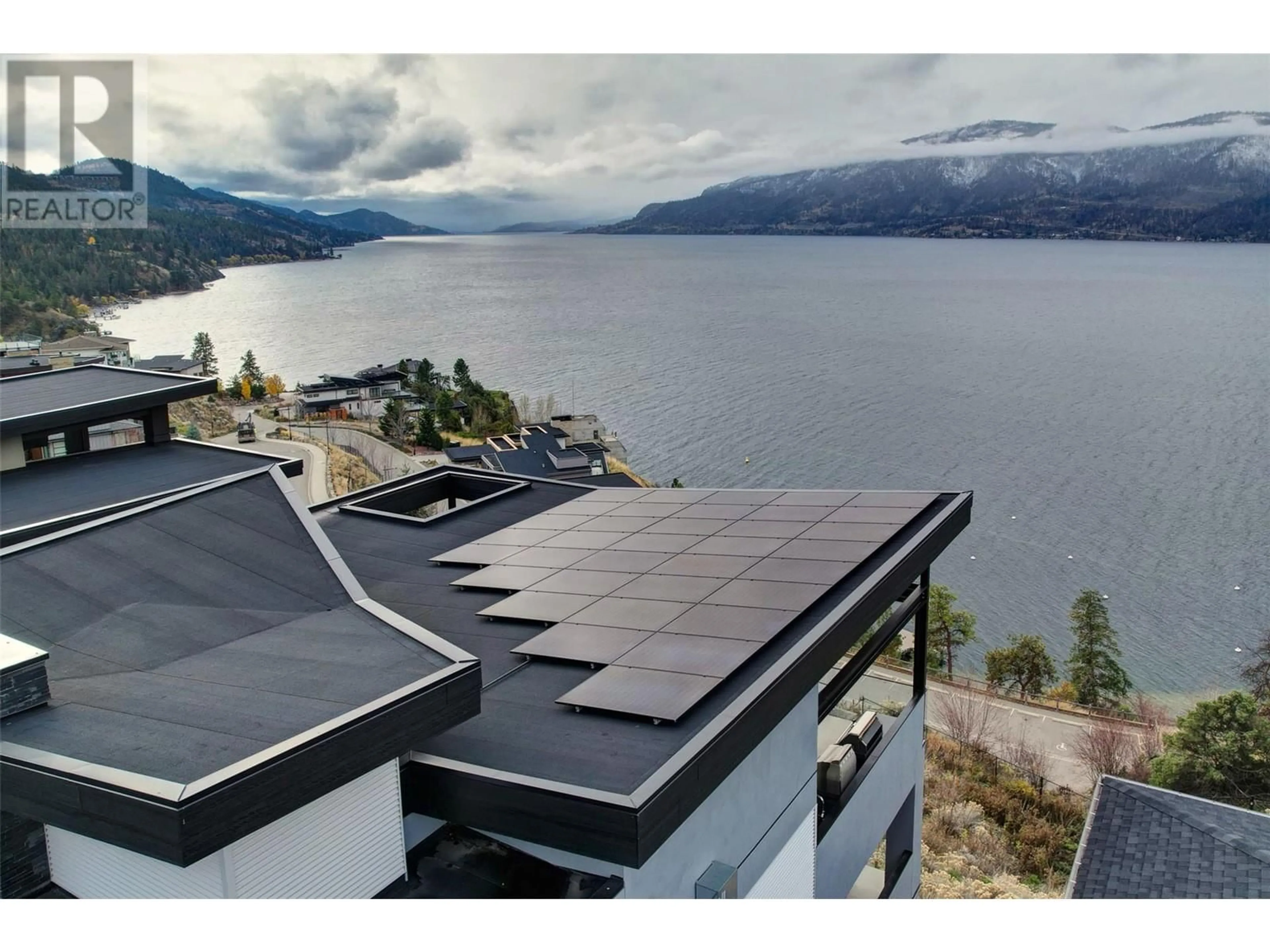 A pic from outside/outdoor area/front of a property/back of a property/a pic from drone, water/lake/river/ocean view for 1506 MARBLE LEDGE DRIVE, Lake Country British Columbia V4V2T4