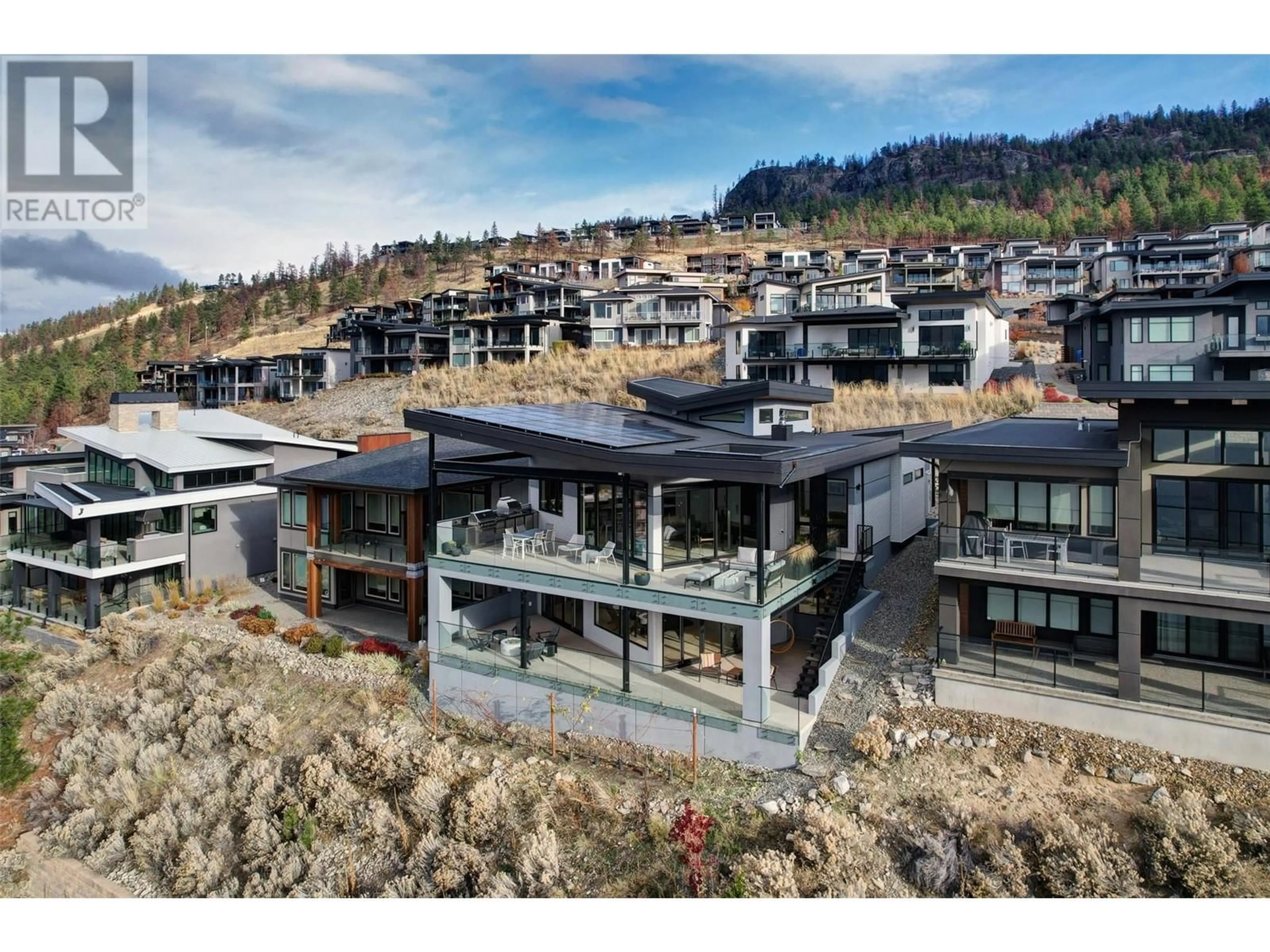 A pic from outside/outdoor area/front of a property/back of a property/a pic from drone, mountain view for 1506 MARBLE LEDGE DRIVE, Lake Country British Columbia V4V2T4