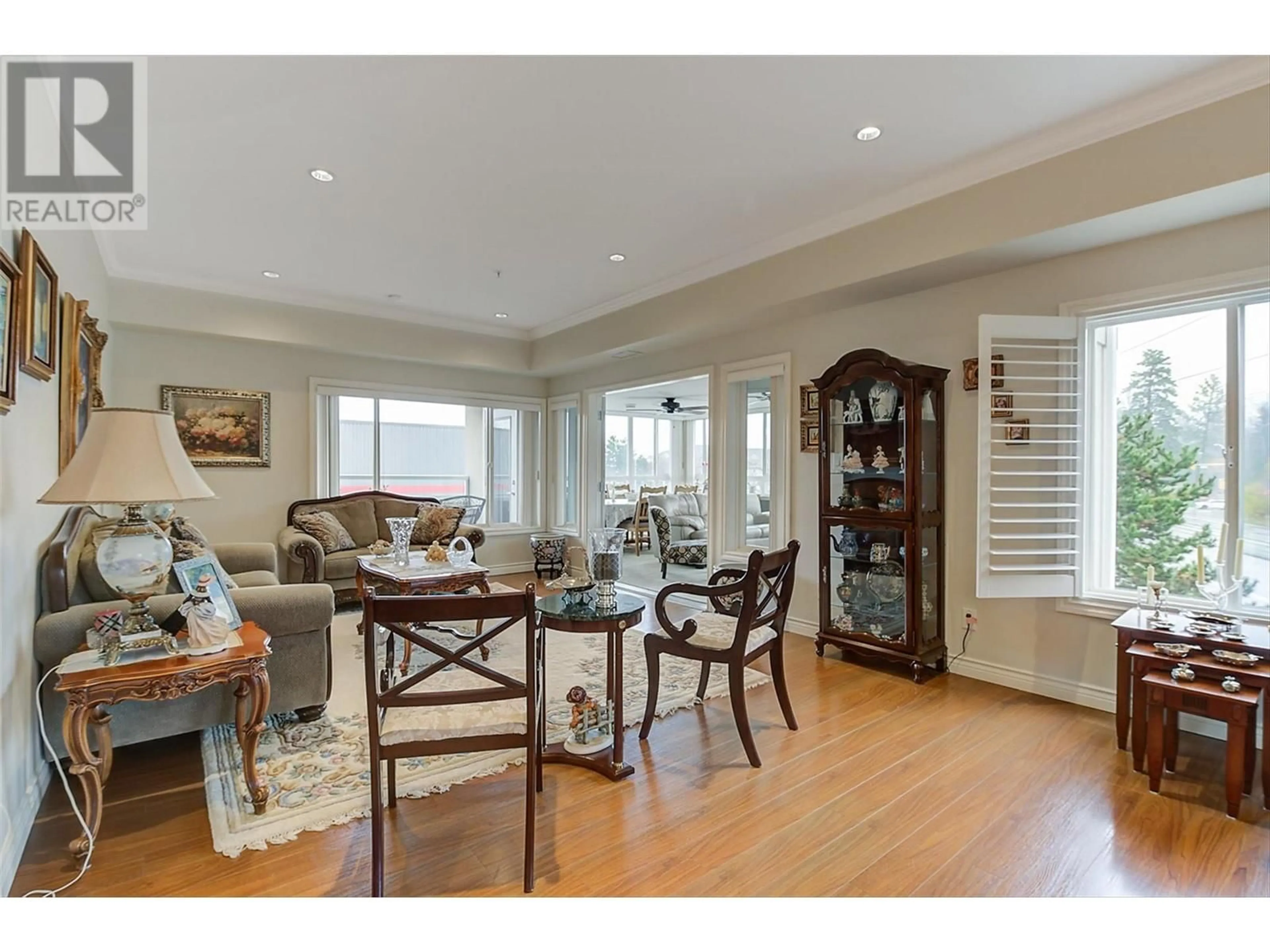 Dining room, wood floors, cottage for 1961 Durnin Road Unit# 305, Kelowna British Columbia V1X7Z6