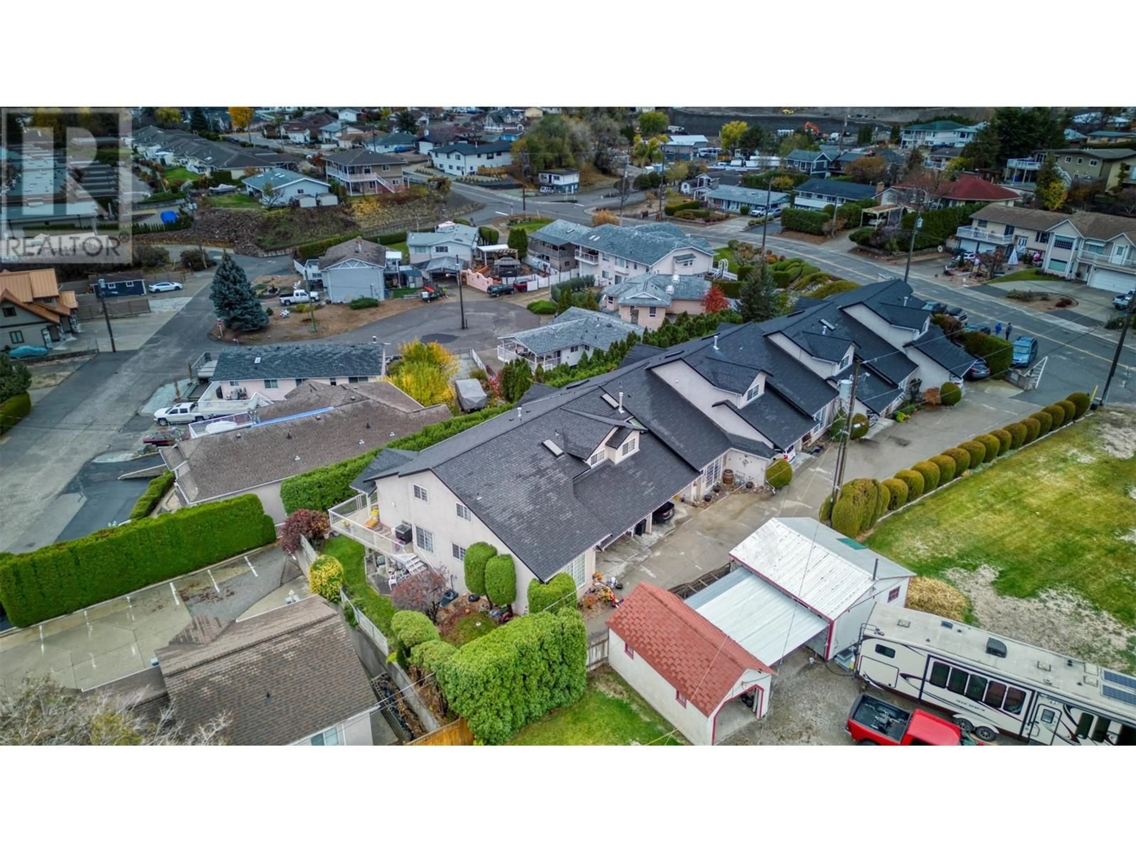 A pic from outside/outdoor area/front of a property/back of a property/a pic from drone, street for 1 - 4805 OLEANDER DRIVE, Osoyoos British Columbia V0H1V1