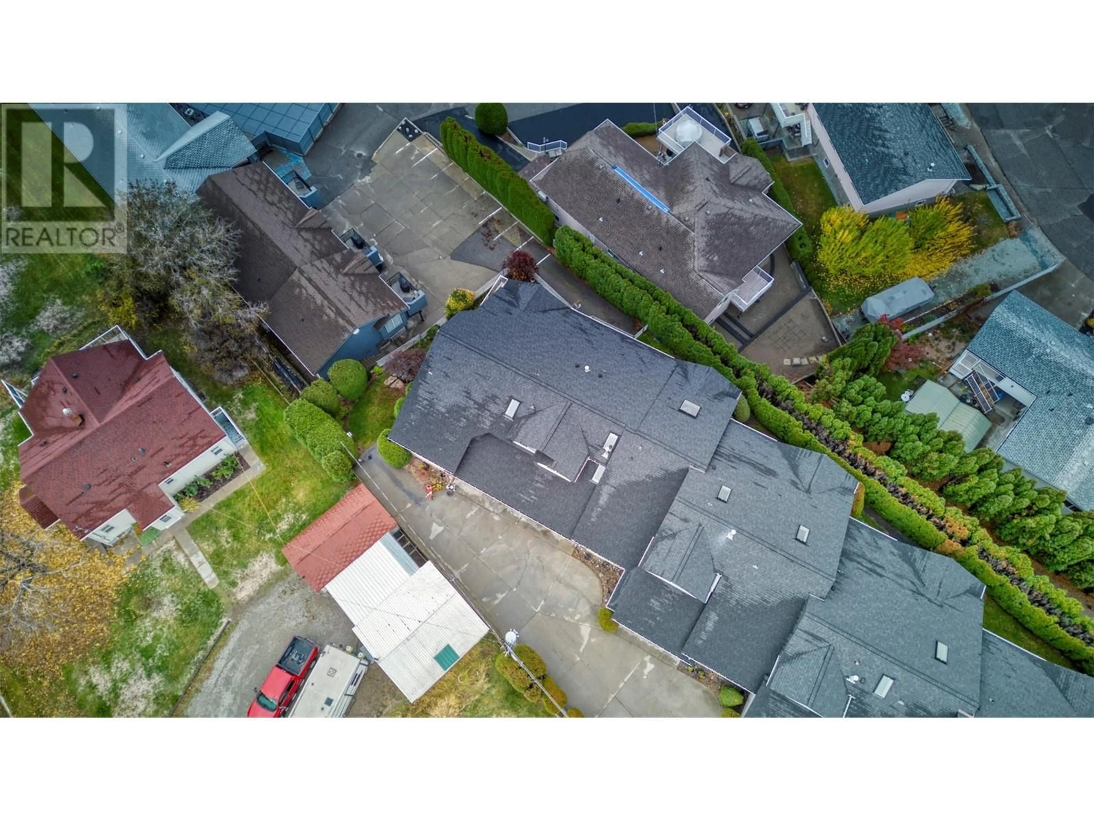 A pic from outside/outdoor area/front of a property/back of a property/a pic from drone, street for 1 - 4805 OLEANDER DRIVE, Osoyoos British Columbia V0H1V1