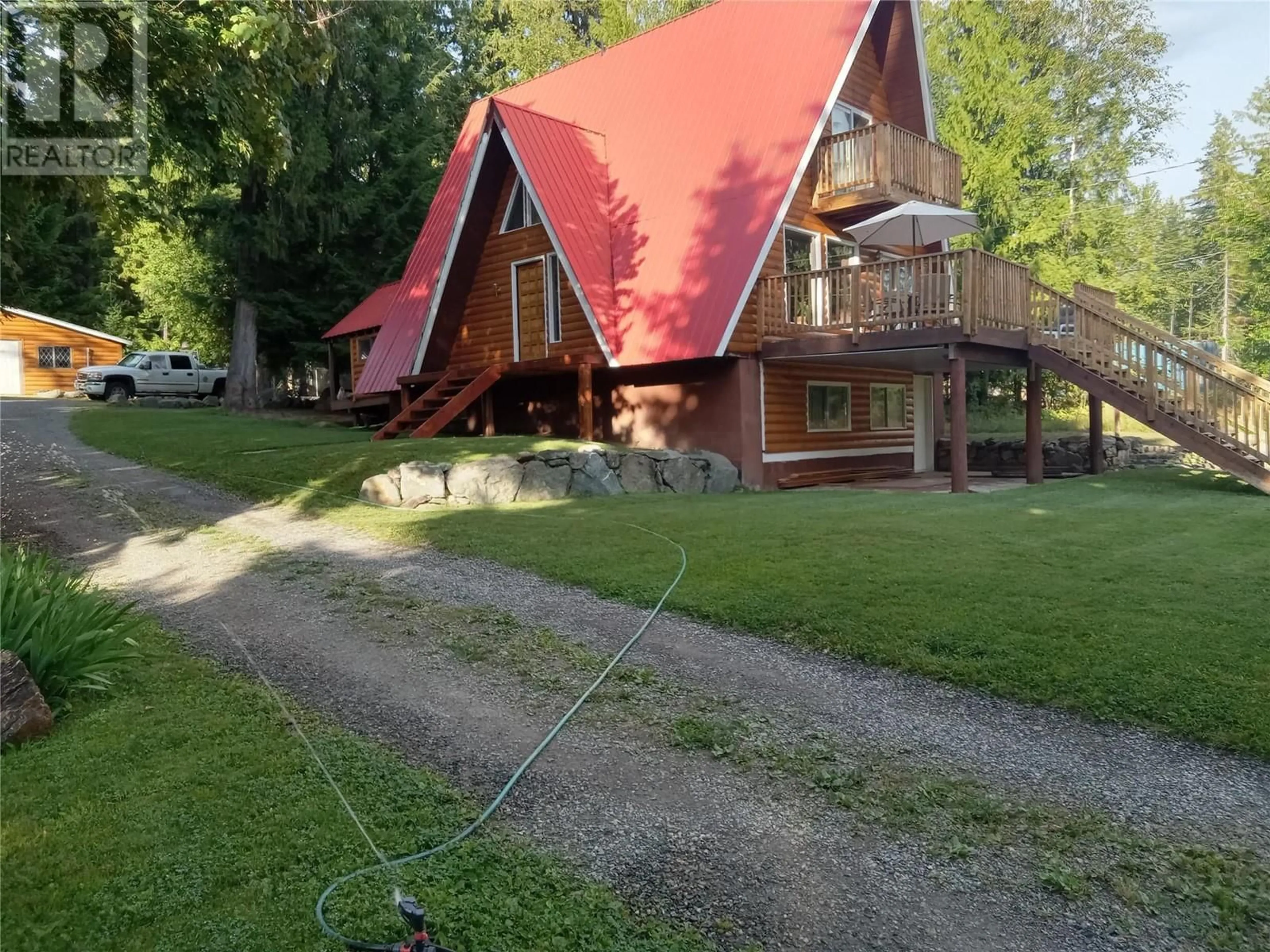 Frontside or backside of a home, cottage for 7680 Mountain Drive, Anglemont British Columbia V0E1M8