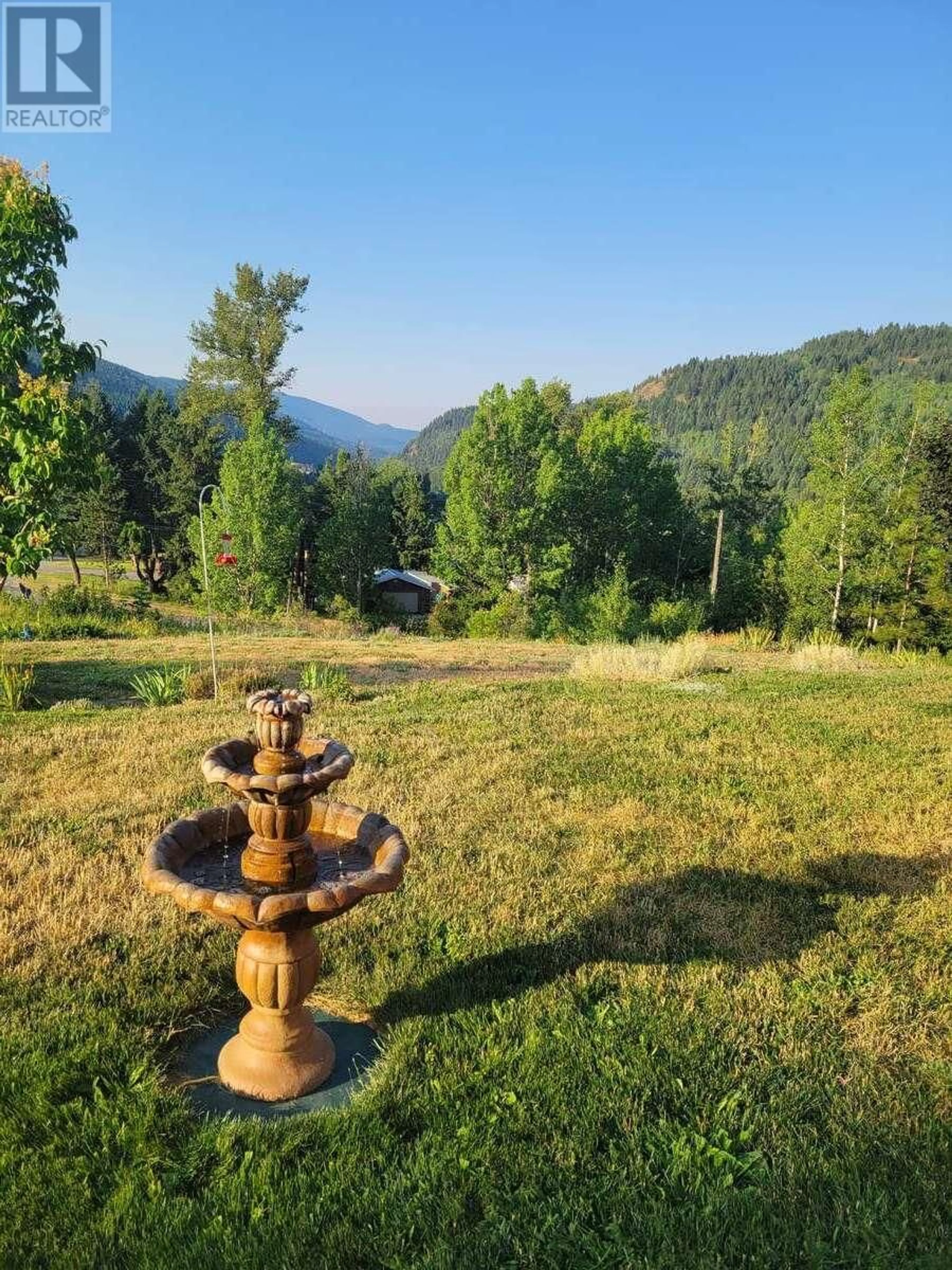 A pic from outside/outdoor area/front of a property/back of a property/a pic from drone, mountain view for 405 ELKHORN STREET, Greenwood British Columbia V0H1J0